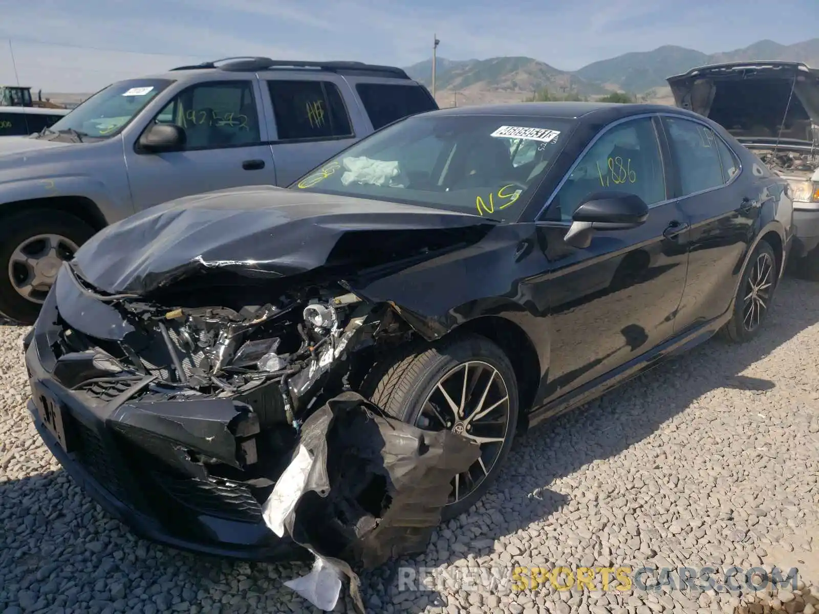 2 Photograph of a damaged car 4T1G11AK4MU424258 TOYOTA CAMRY 2021