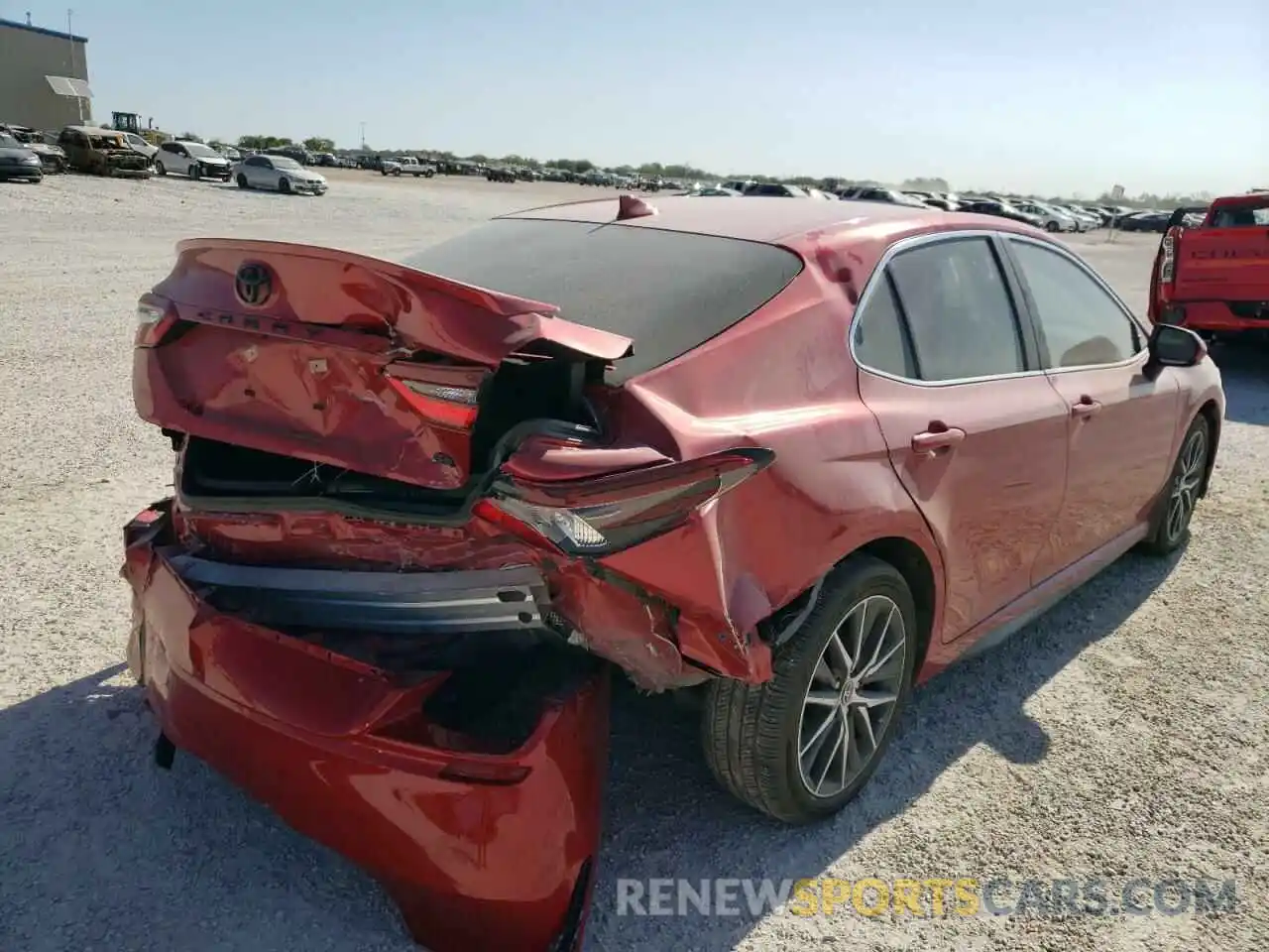 4 Photograph of a damaged car 4T1G11AK4MU448477 TOYOTA CAMRY 2021