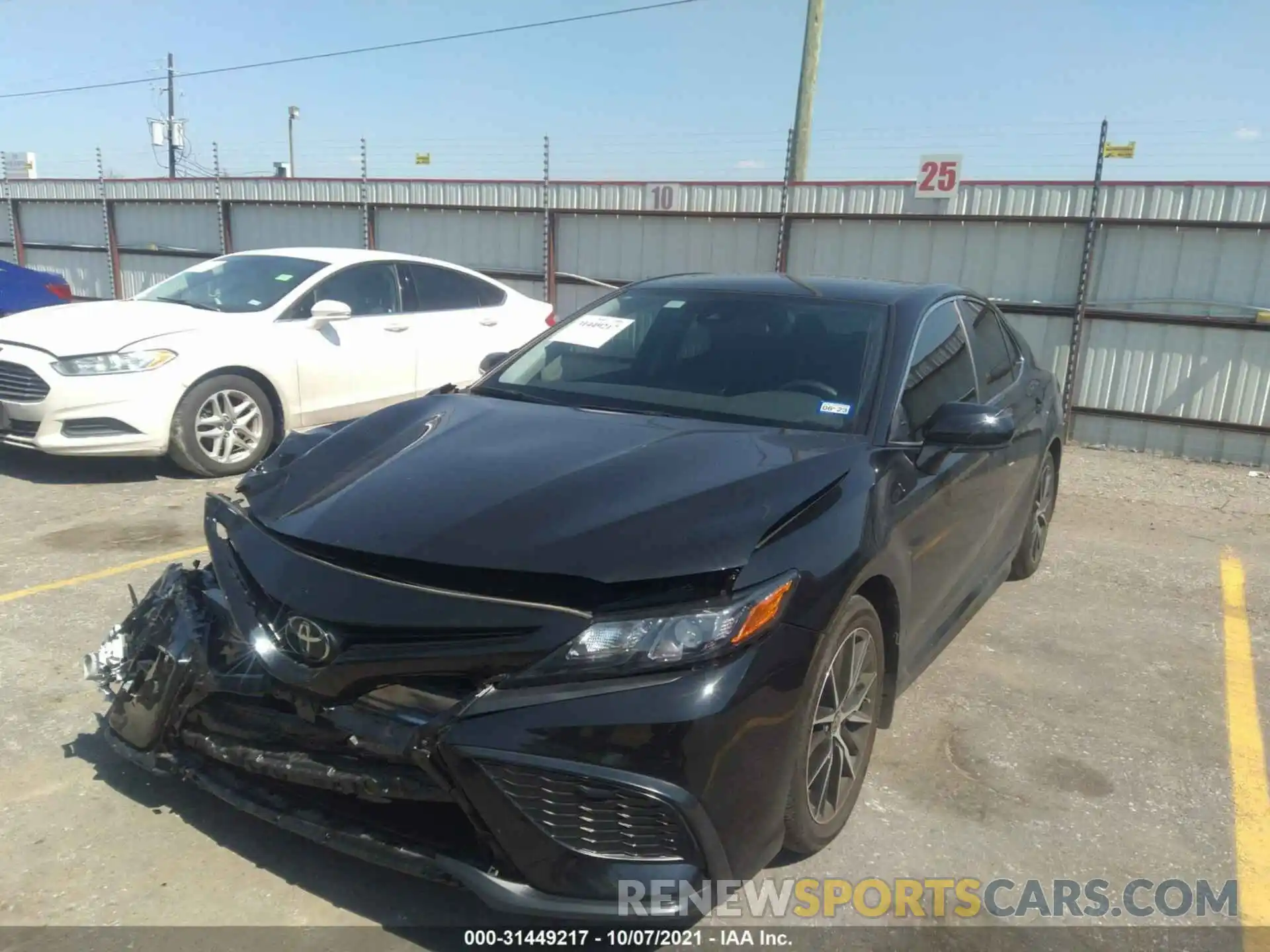 2 Photograph of a damaged car 4T1G11AK4MU472939 TOYOTA CAMRY 2021