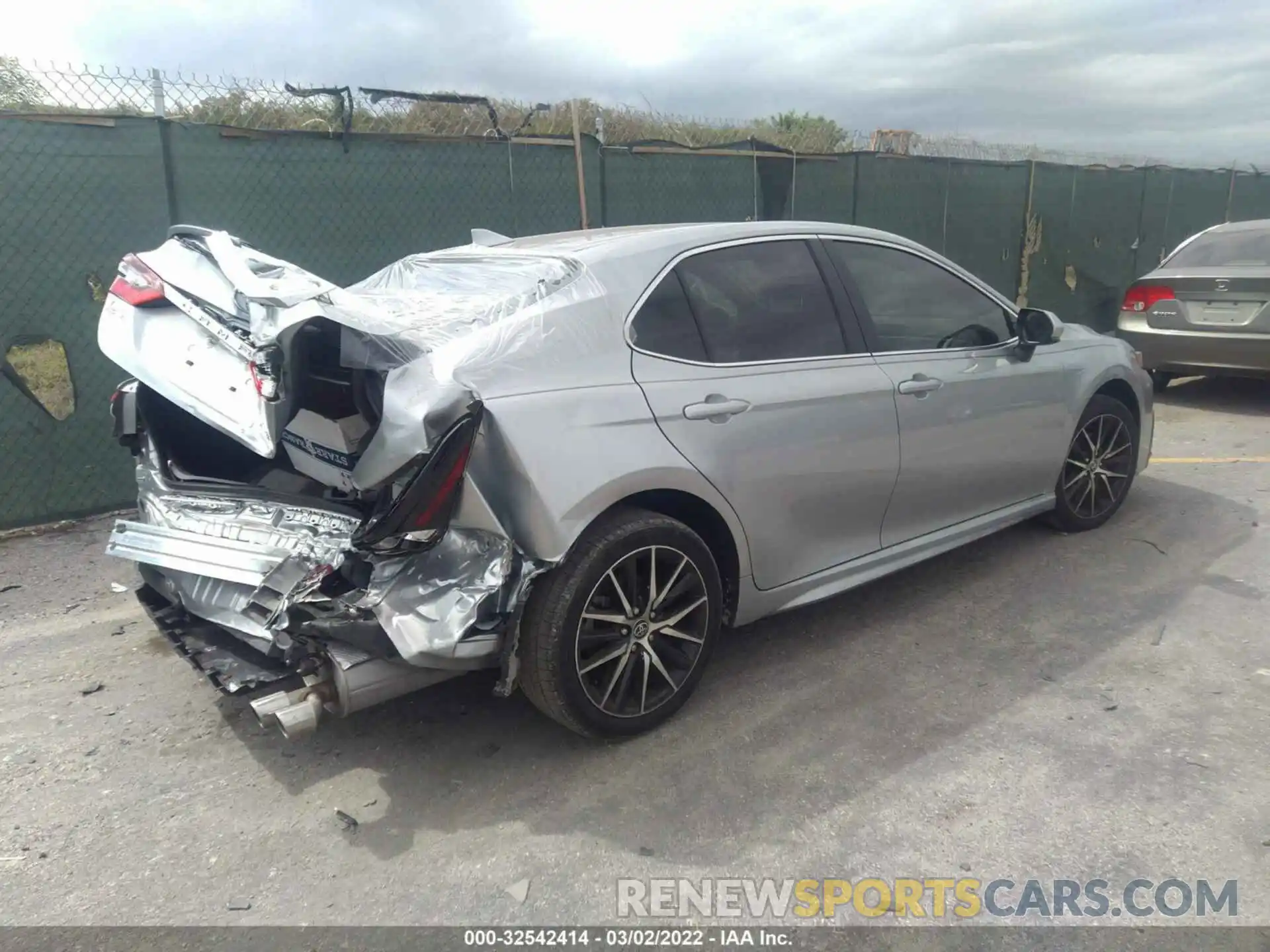 4 Photograph of a damaged car 4T1G11AK4MU542228 TOYOTA CAMRY 2021