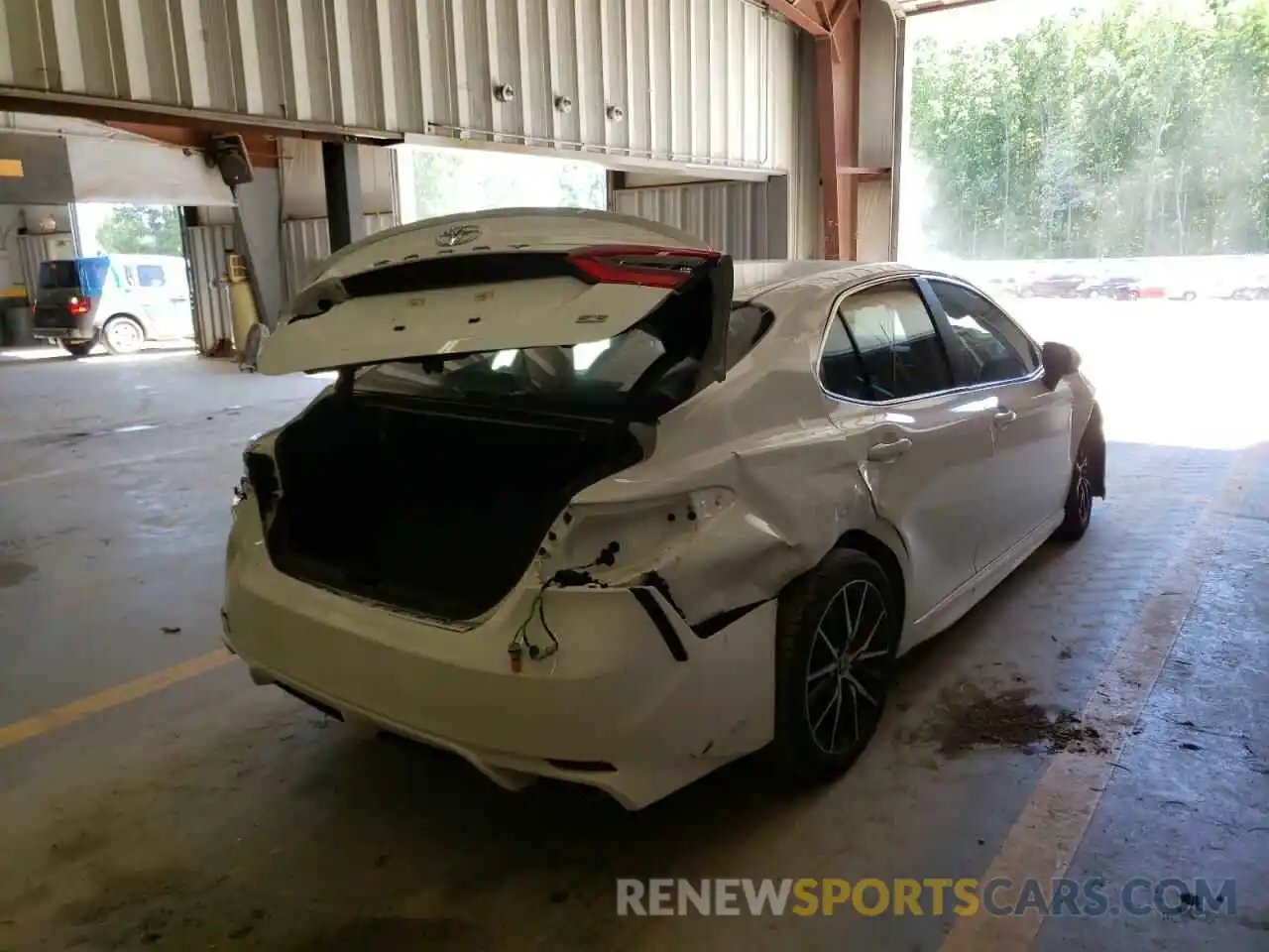 4 Photograph of a damaged car 4T1G11AK4MU562799 TOYOTA CAMRY 2021