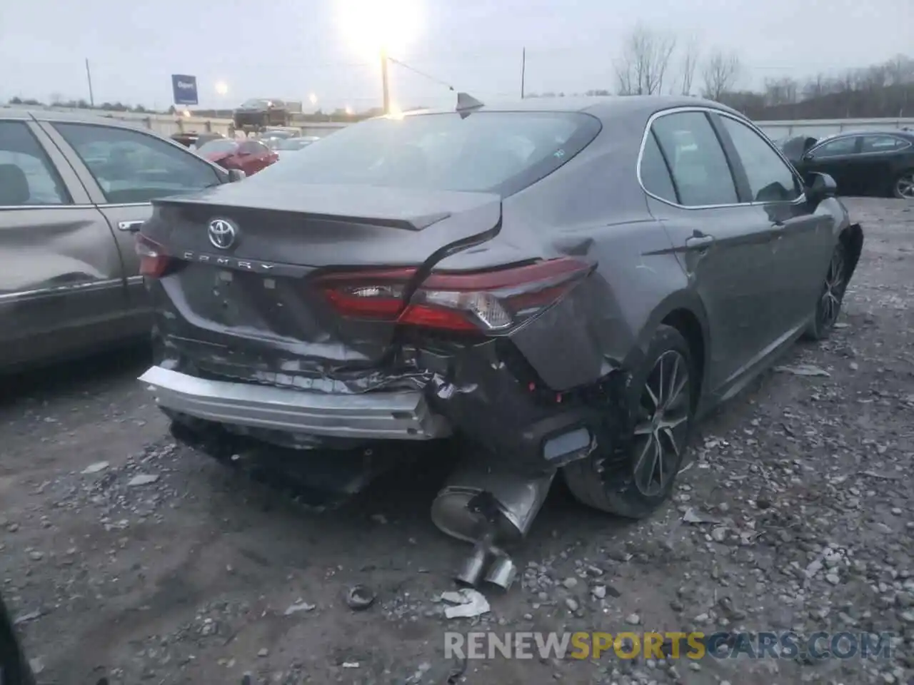 4 Photograph of a damaged car 4T1G11AK4MU565363 TOYOTA CAMRY 2021