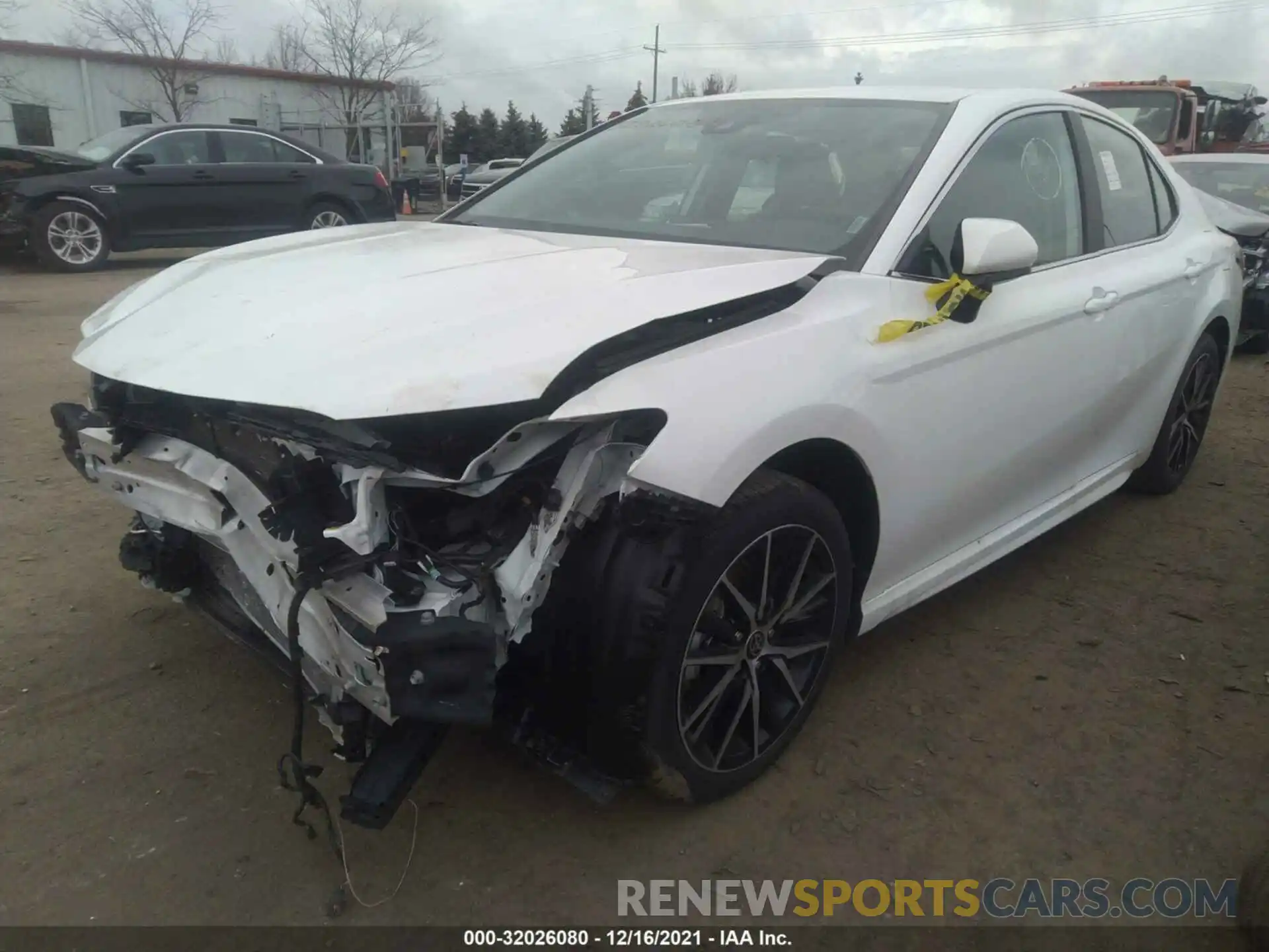 2 Photograph of a damaged car 4T1G11AK4MU574595 TOYOTA CAMRY 2021