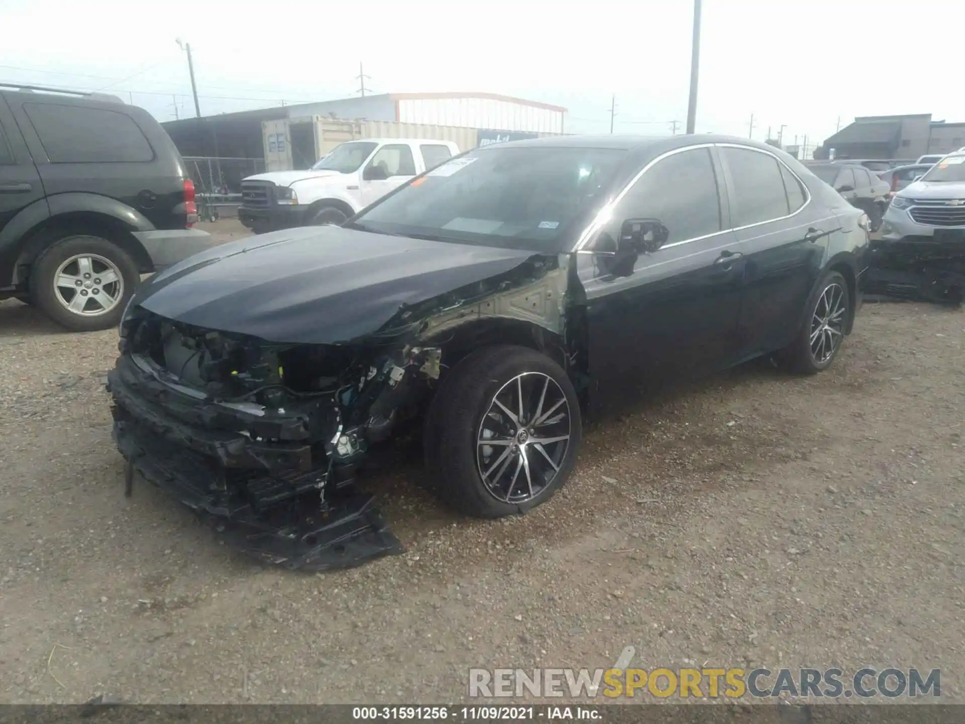 2 Photograph of a damaged car 4T1G11AK4MU614125 TOYOTA CAMRY 2021