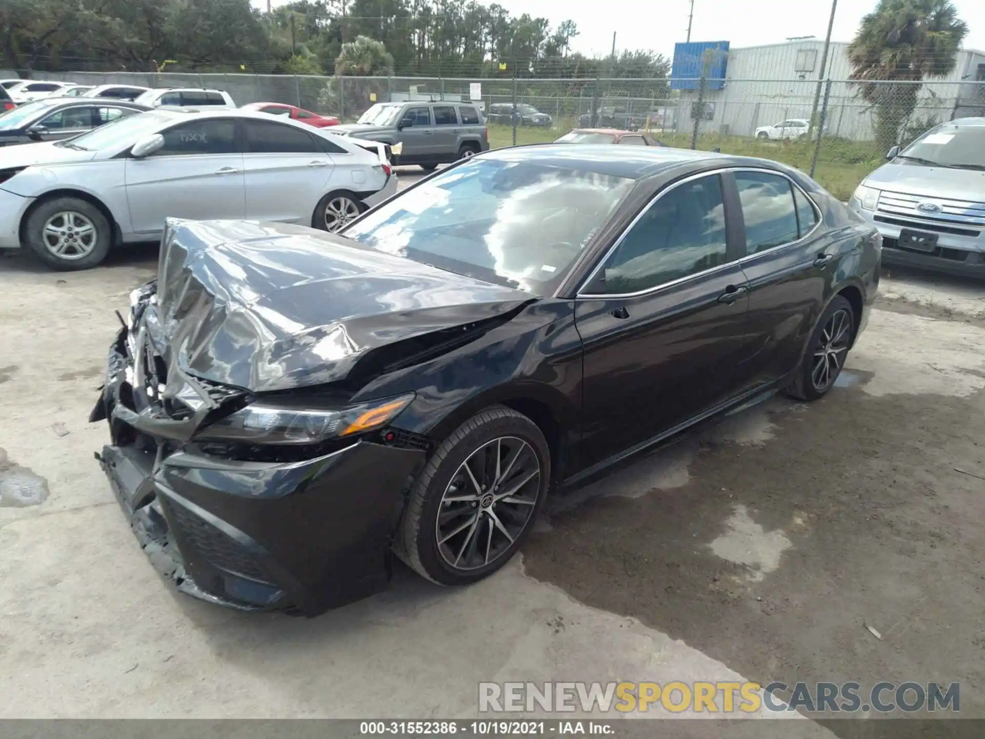 2 Photograph of a damaged car 4T1G11AK5MU409381 TOYOTA CAMRY 2021