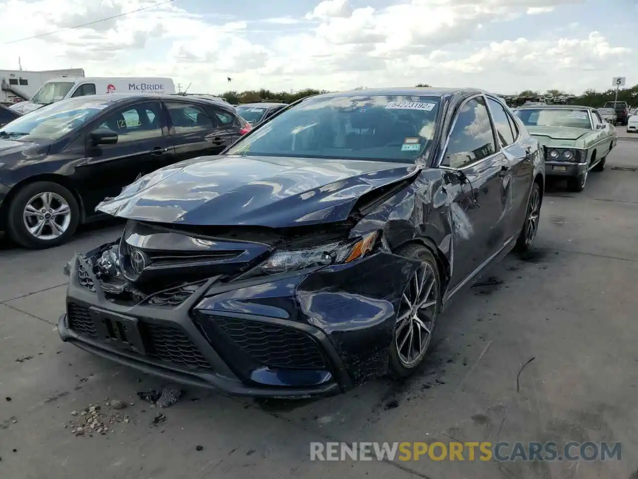 2 Photograph of a damaged car 4T1G11AK5MU409428 TOYOTA CAMRY 2021