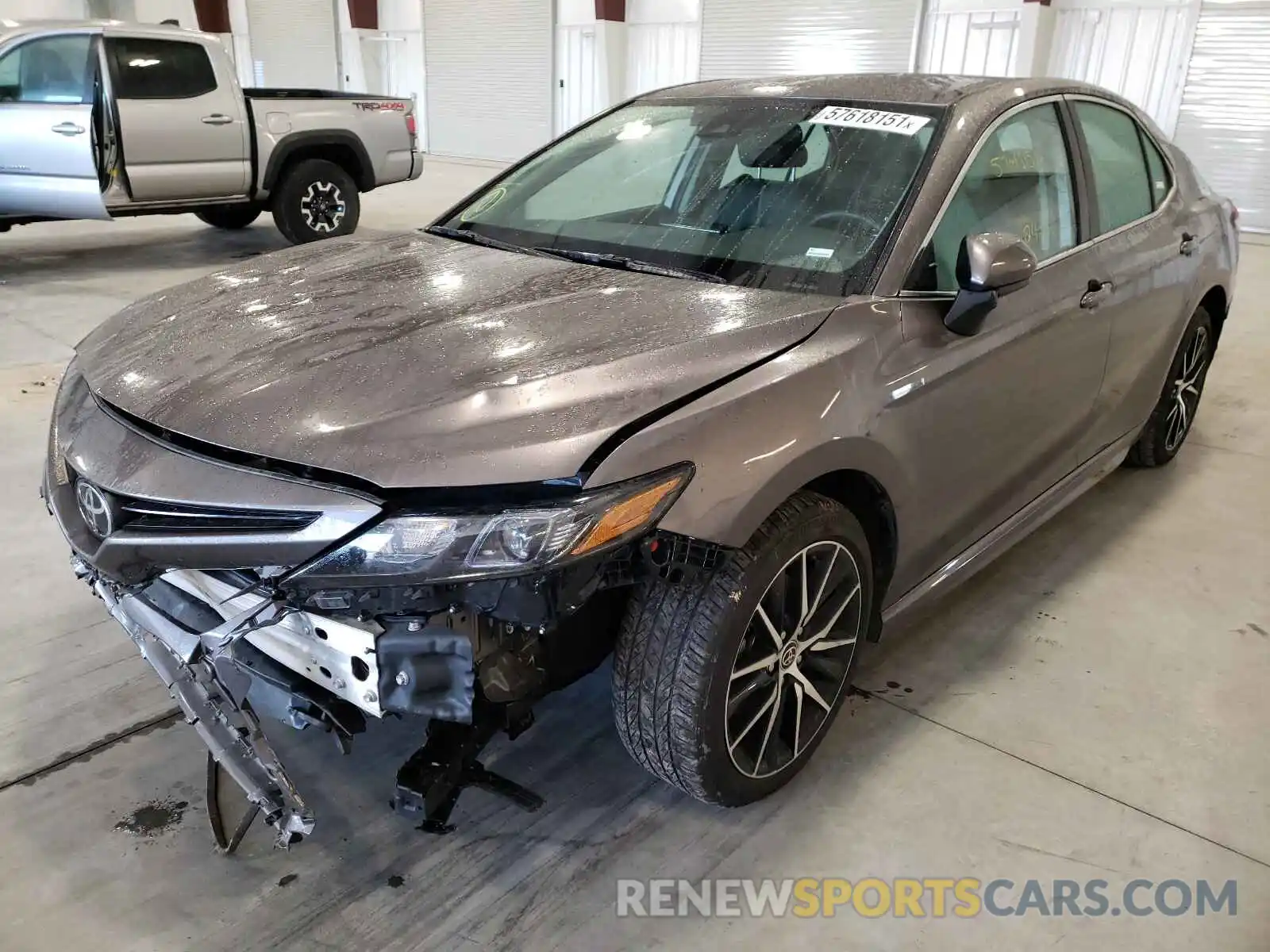 2 Photograph of a damaged car 4T1G11AK5MU413687 TOYOTA CAMRY 2021