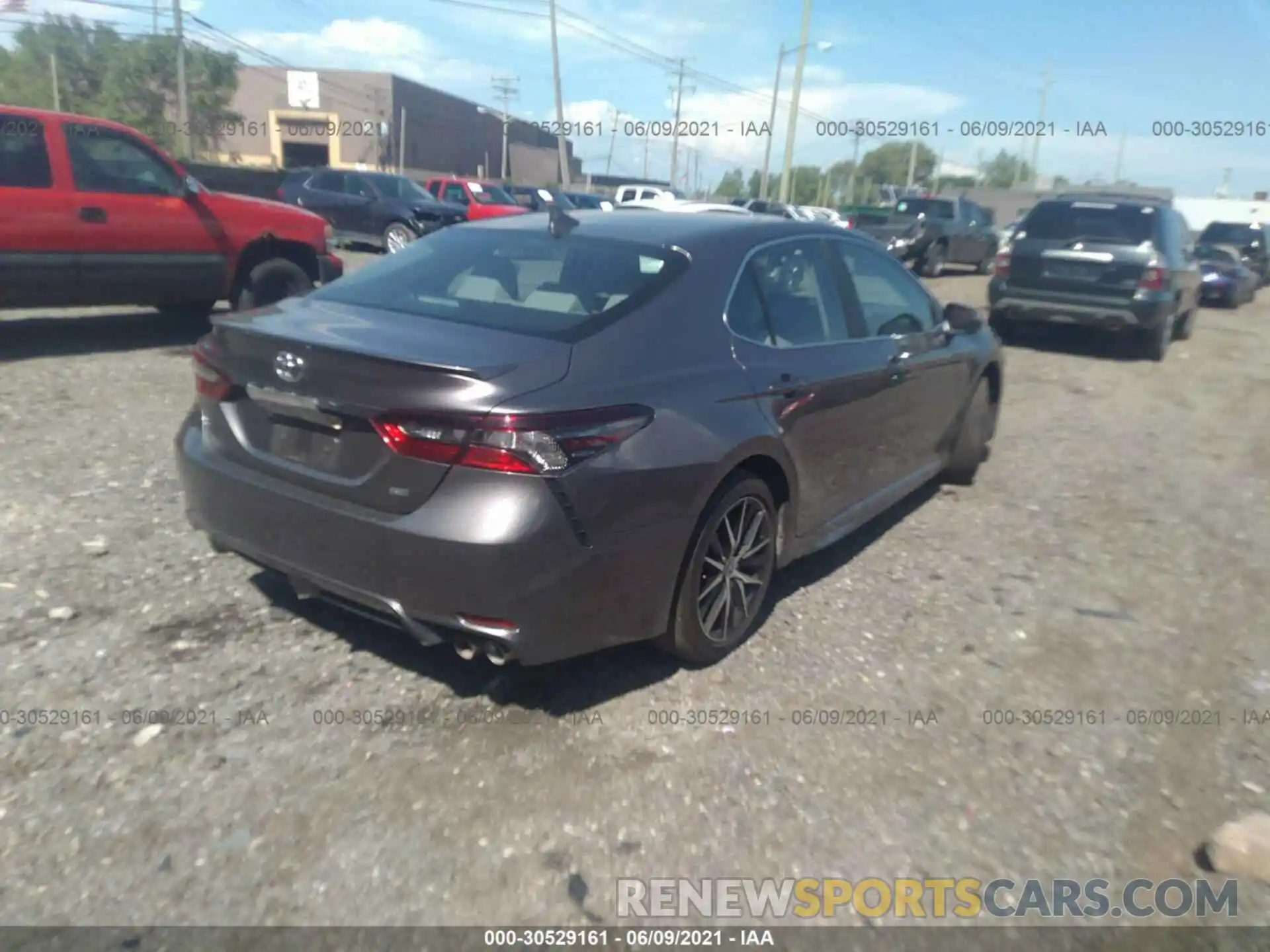 4 Photograph of a damaged car 4T1G11AK5MU431624 TOYOTA CAMRY 2021