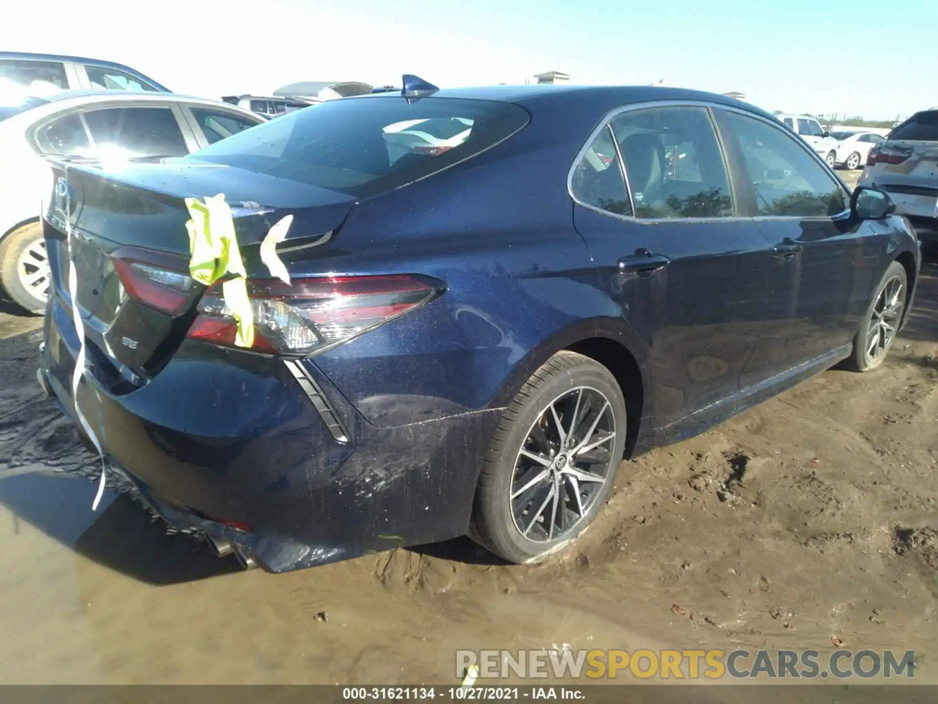 4 Photograph of a damaged car 4T1G11AK5MU461285 TOYOTA CAMRY 2021