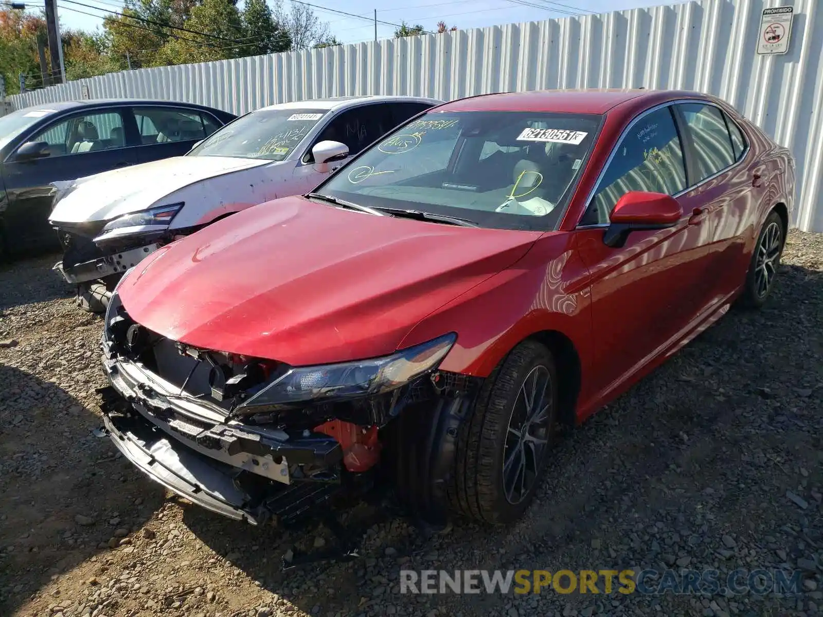 2 Photograph of a damaged car 4T1G11AK5MU468124 TOYOTA CAMRY 2021