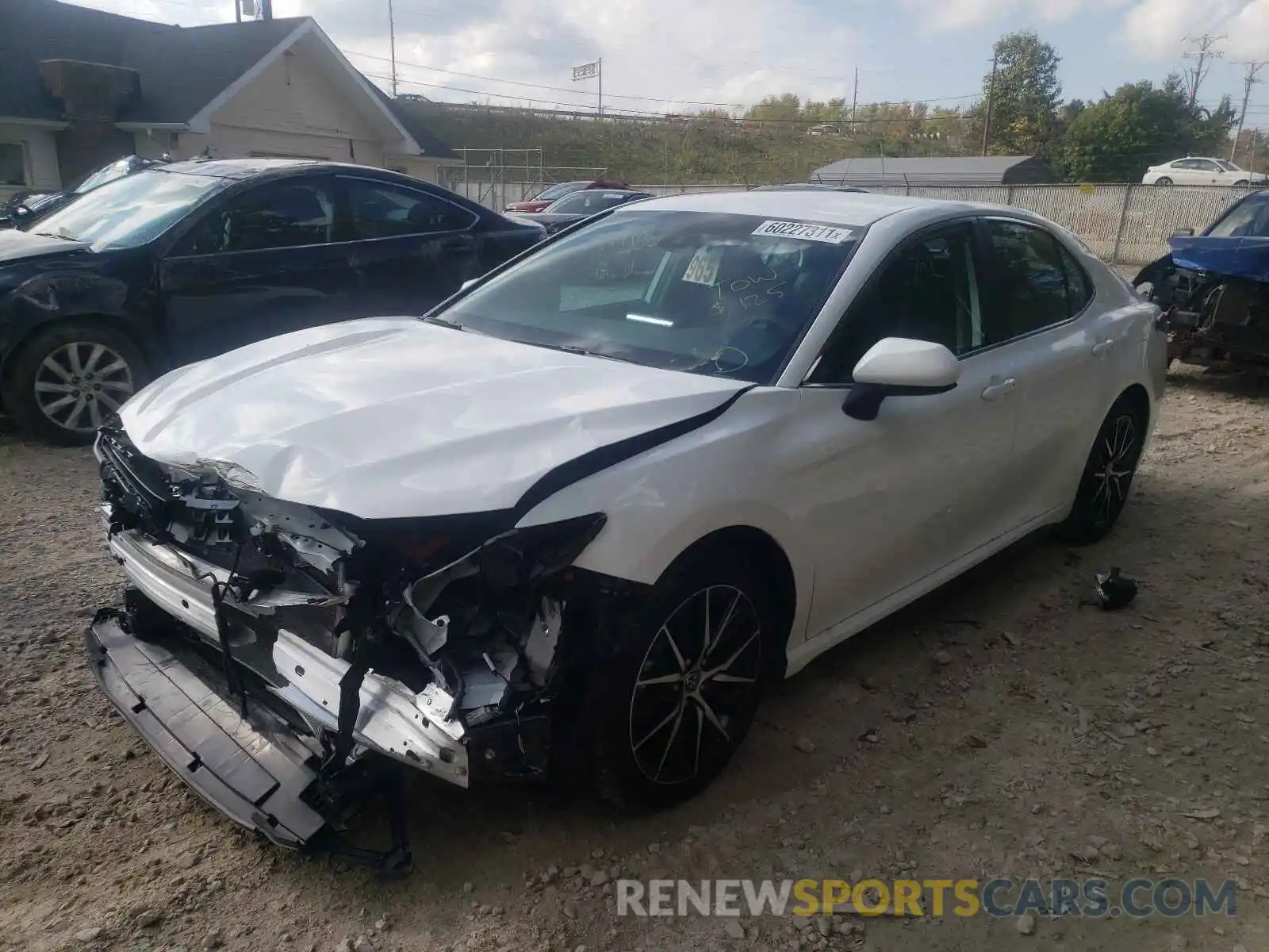 2 Photograph of a damaged car 4T1G11AK5MU481309 TOYOTA CAMRY 2021