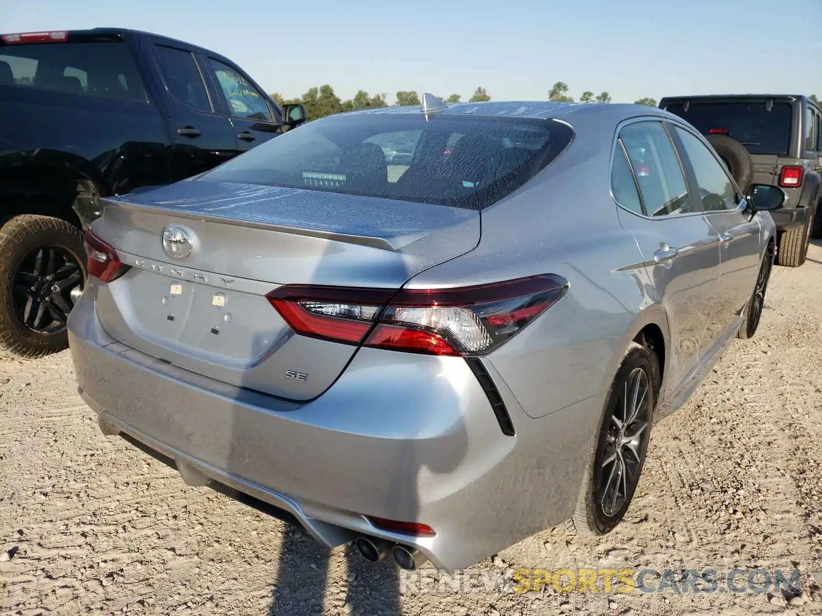 4 Photograph of a damaged car 4T1G11AK5MU525471 TOYOTA CAMRY 2021