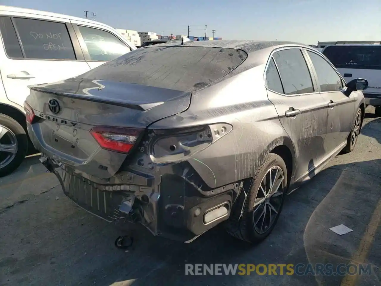 4 Photograph of a damaged car 4T1G11AK5MU549544 TOYOTA CAMRY 2021