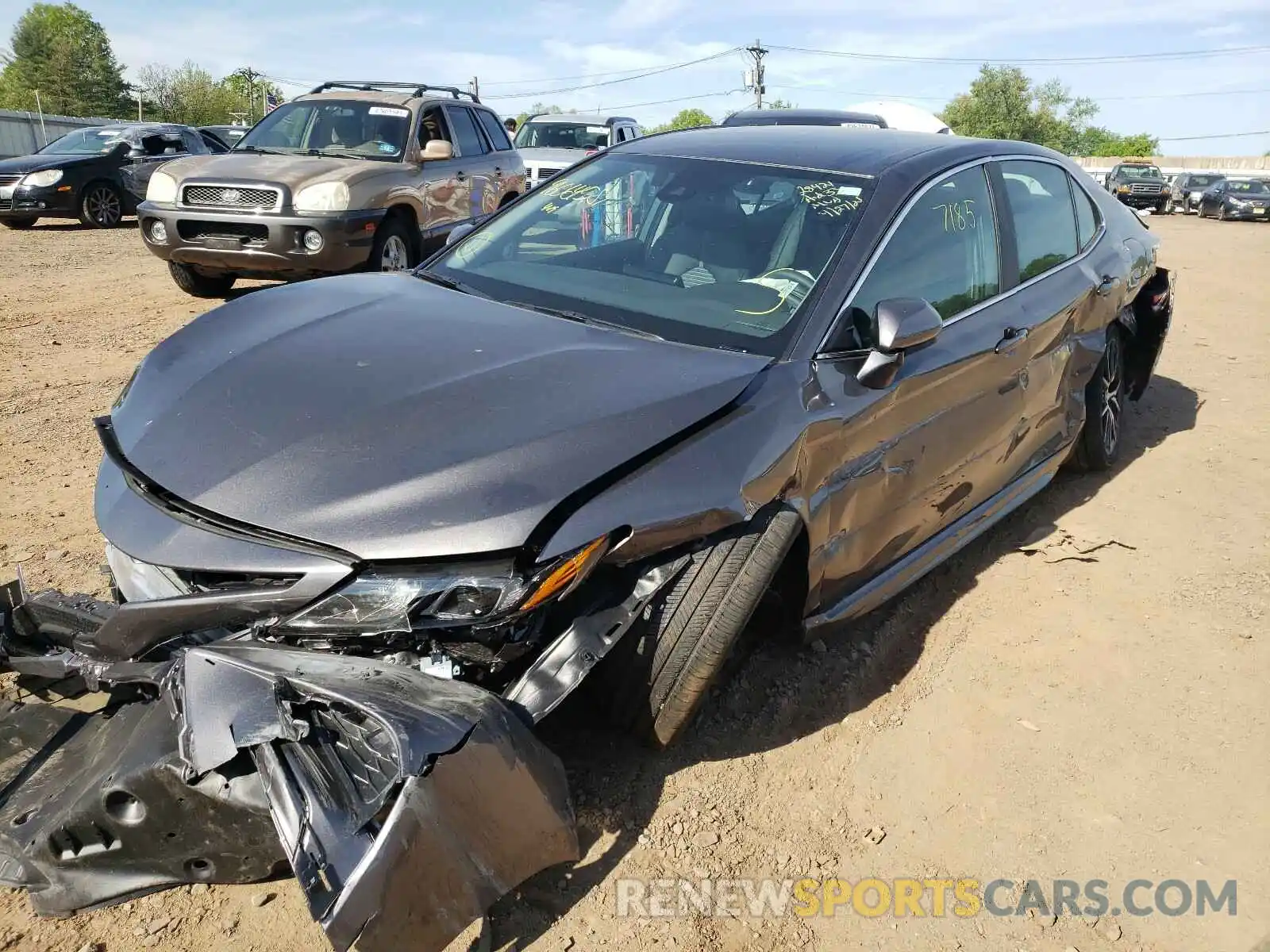 2 Photograph of a damaged car 4T1G11AK5MU558647 TOYOTA CAMRY 2021