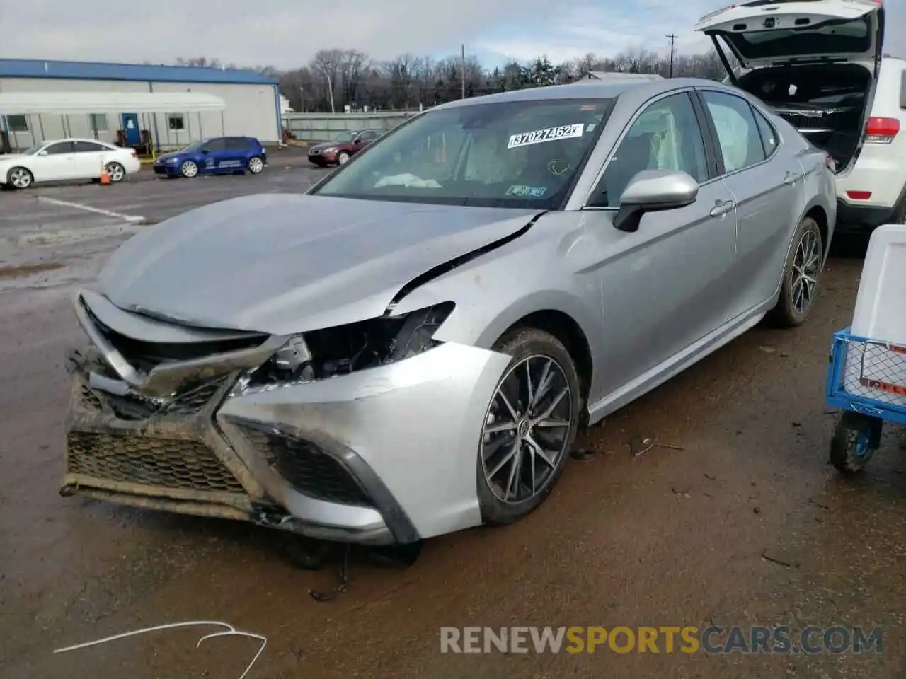 2 Photograph of a damaged car 4T1G11AK5MU560995 TOYOTA CAMRY 2021