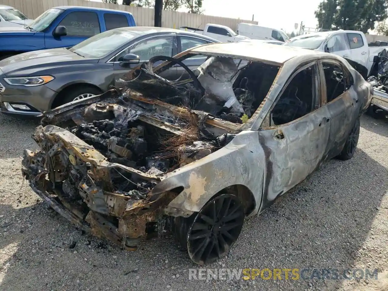 2 Photograph of a damaged car 4T1G11AK5MU563606 TOYOTA CAMRY 2021