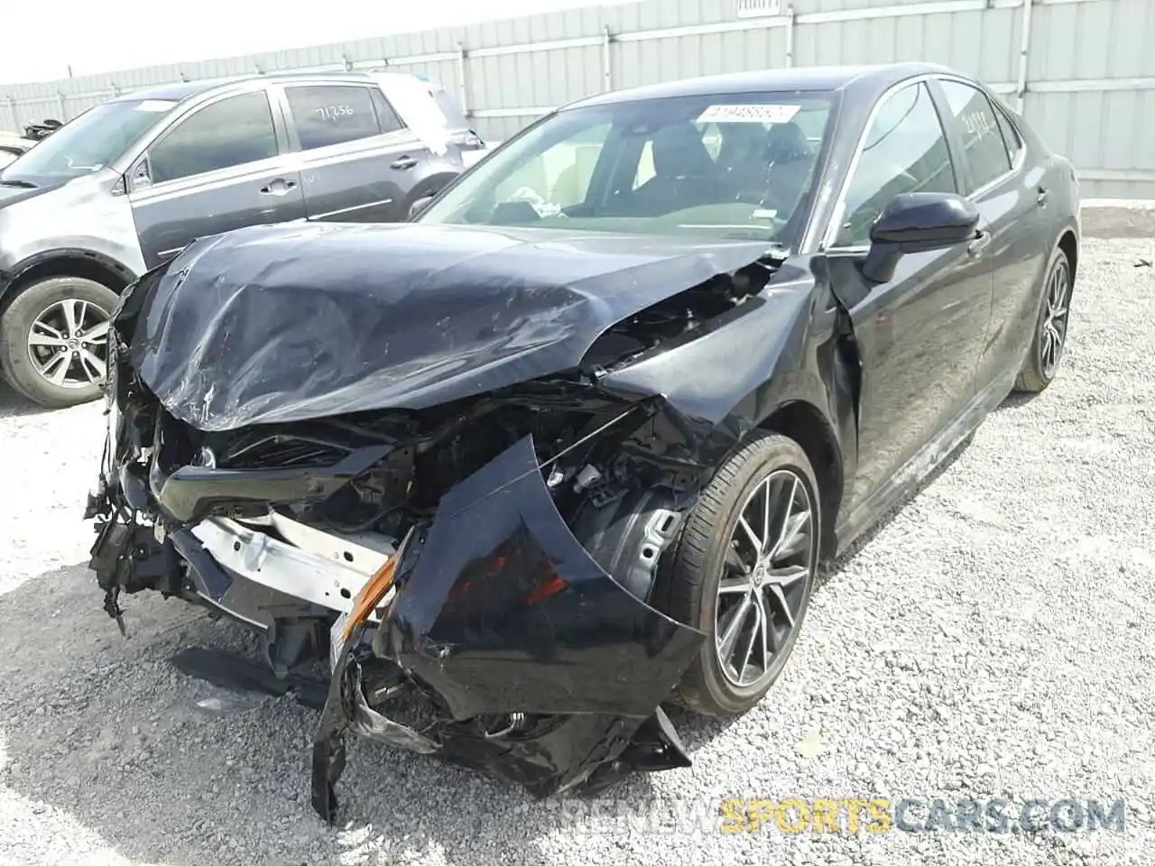 2 Photograph of a damaged car 4T1G11AK5MU571396 TOYOTA CAMRY 2021