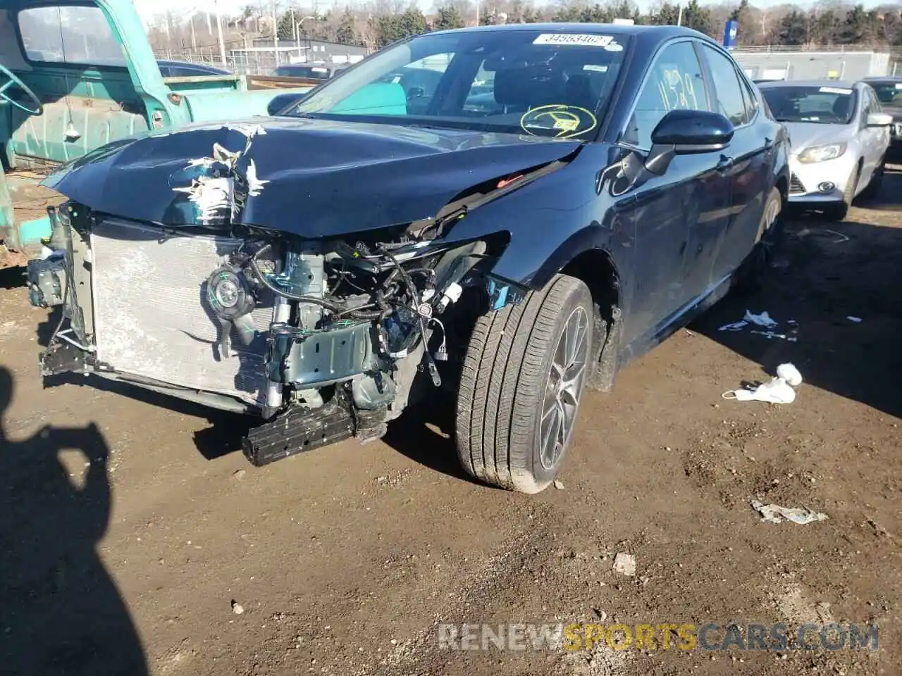 2 Photograph of a damaged car 4T1G11AK5MU579708 TOYOTA CAMRY 2021