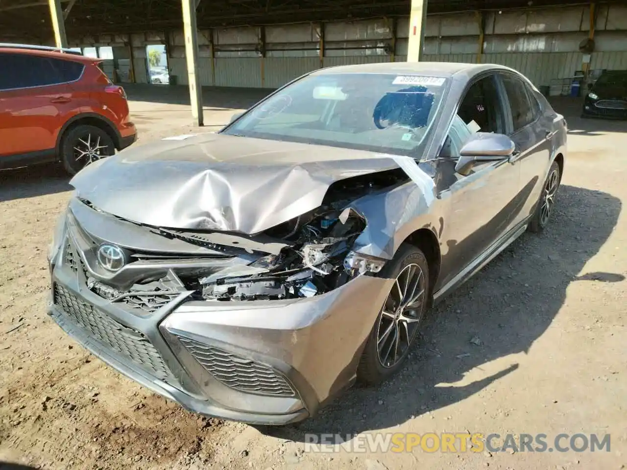 2 Photograph of a damaged car 4T1G11AK5MU579918 TOYOTA CAMRY 2021