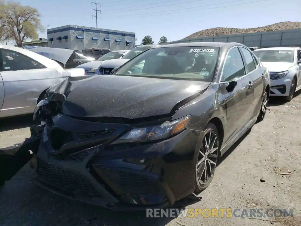 2 Photograph of a damaged car 4T1G11AK5MU583094 TOYOTA CAMRY 2021