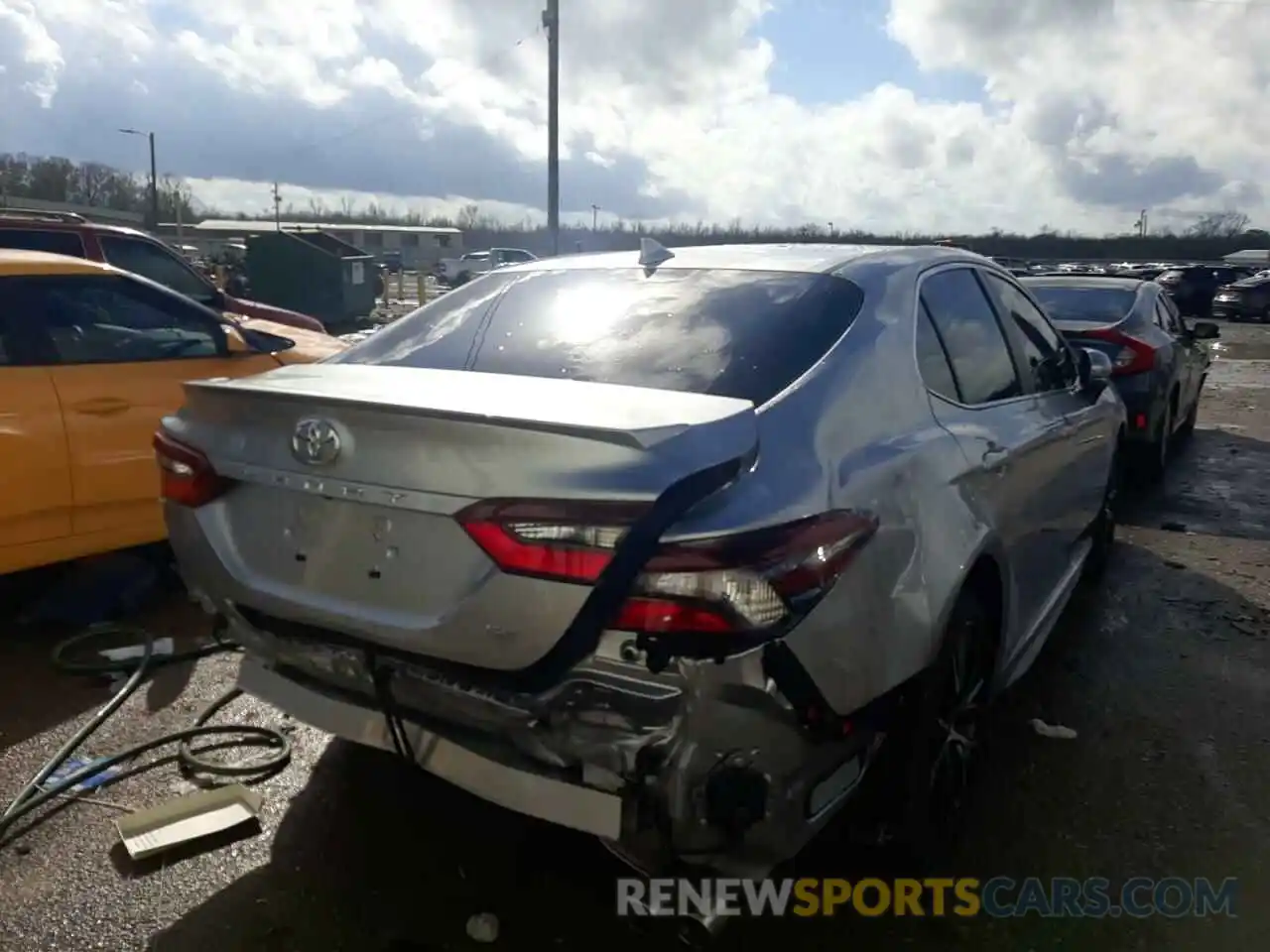 4 Photograph of a damaged car 4T1G11AK5MU604428 TOYOTA CAMRY 2021