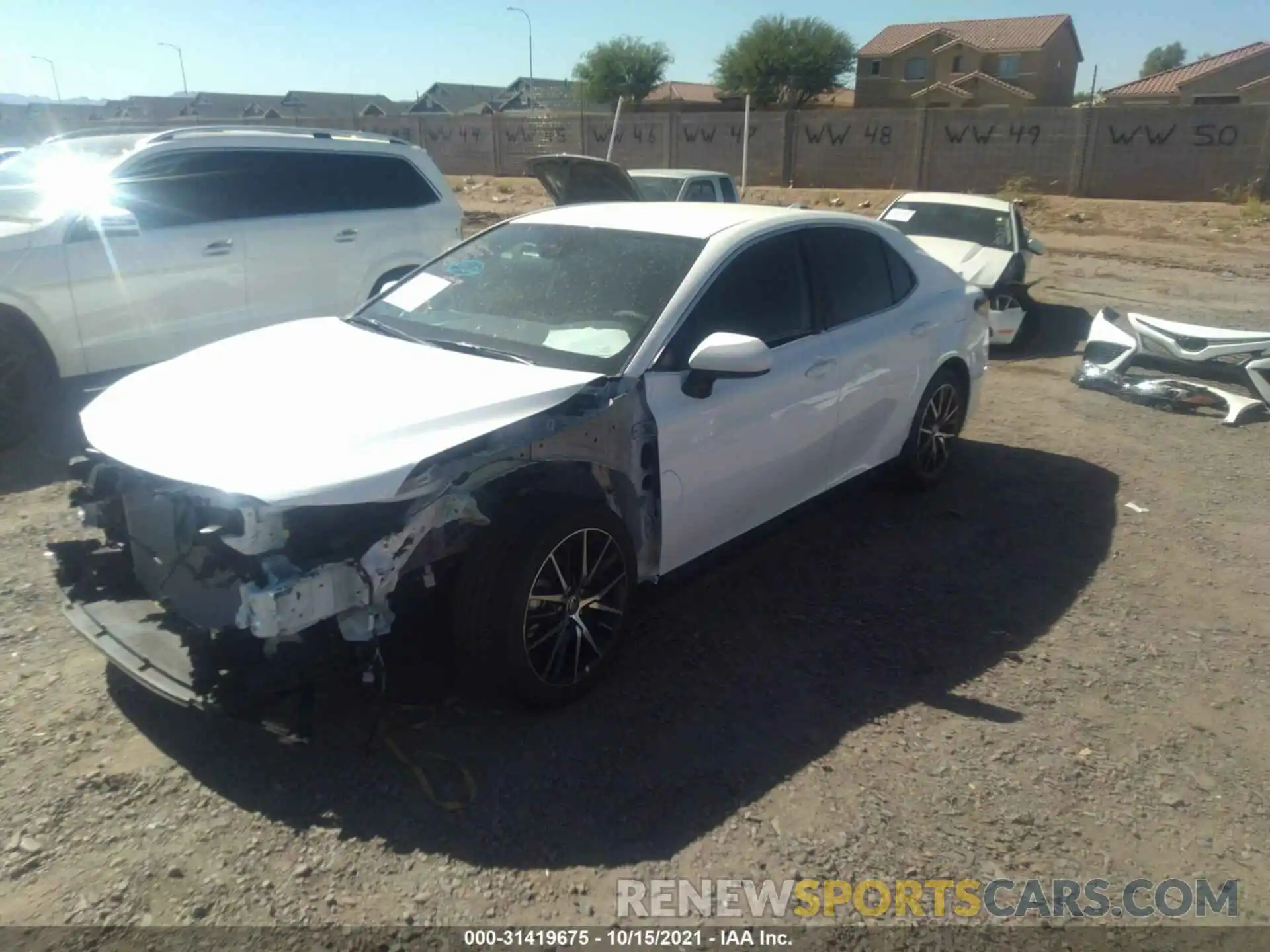 2 Photograph of a damaged car 4T1G11AK5MU606518 TOYOTA CAMRY 2021