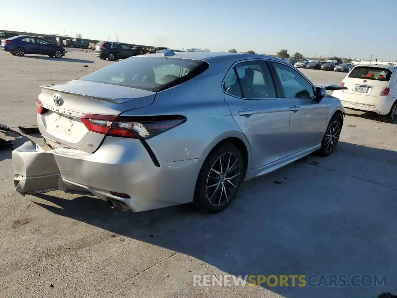 4 Photograph of a damaged car 4T1G11AK6MU408644 TOYOTA CAMRY 2021