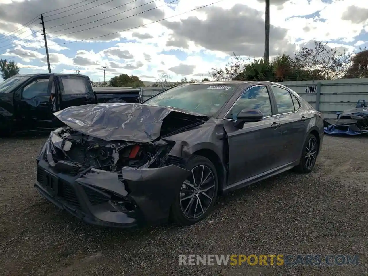 2 Photograph of a damaged car 4T1G11AK6MU446973 TOYOTA CAMRY 2021