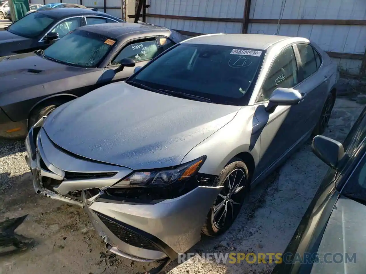 2 Photograph of a damaged car 4T1G11AK6MU460145 TOYOTA CAMRY 2021