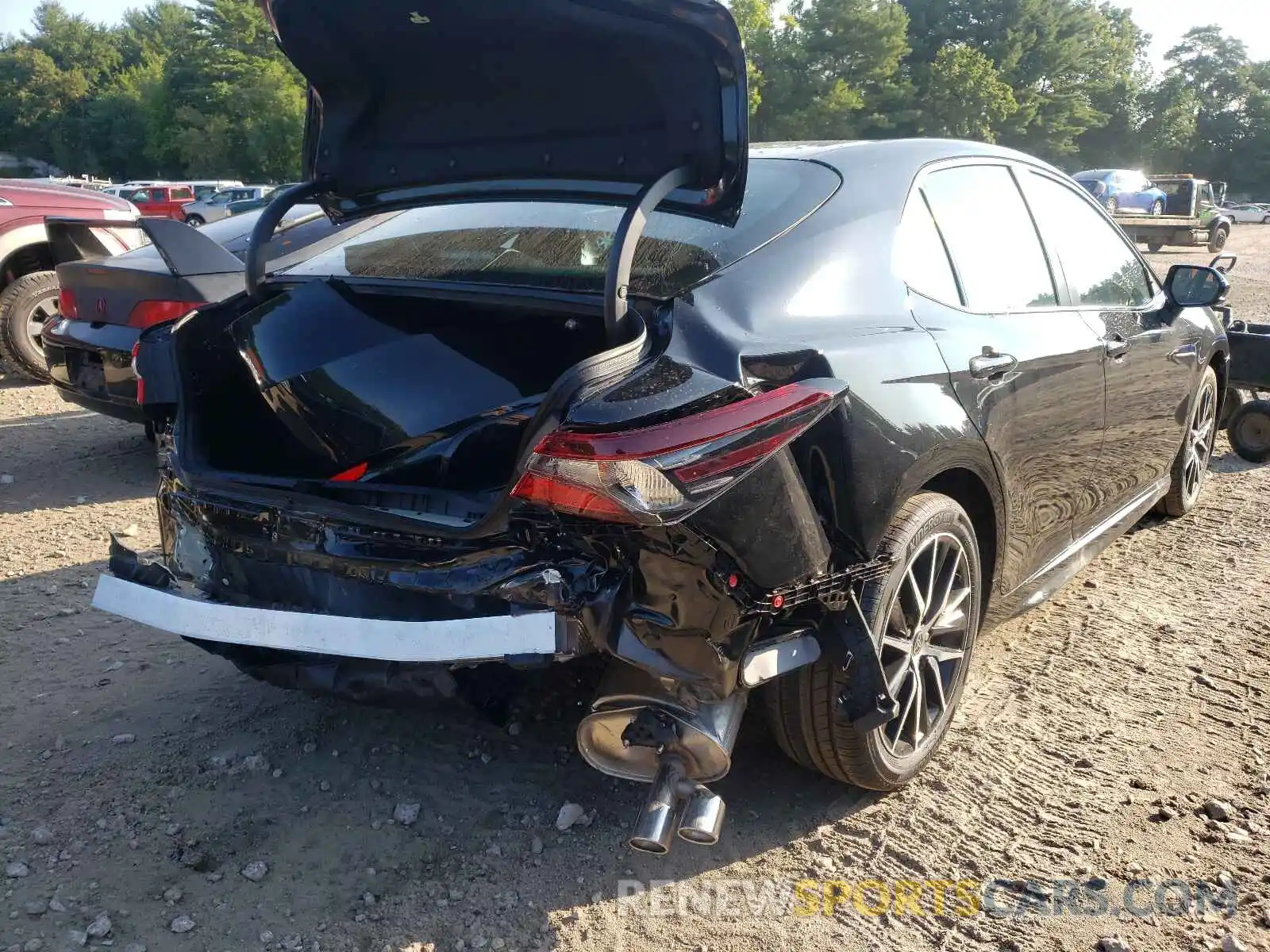 4 Photograph of a damaged car 4T1G11AK6MU477950 TOYOTA CAMRY 2021