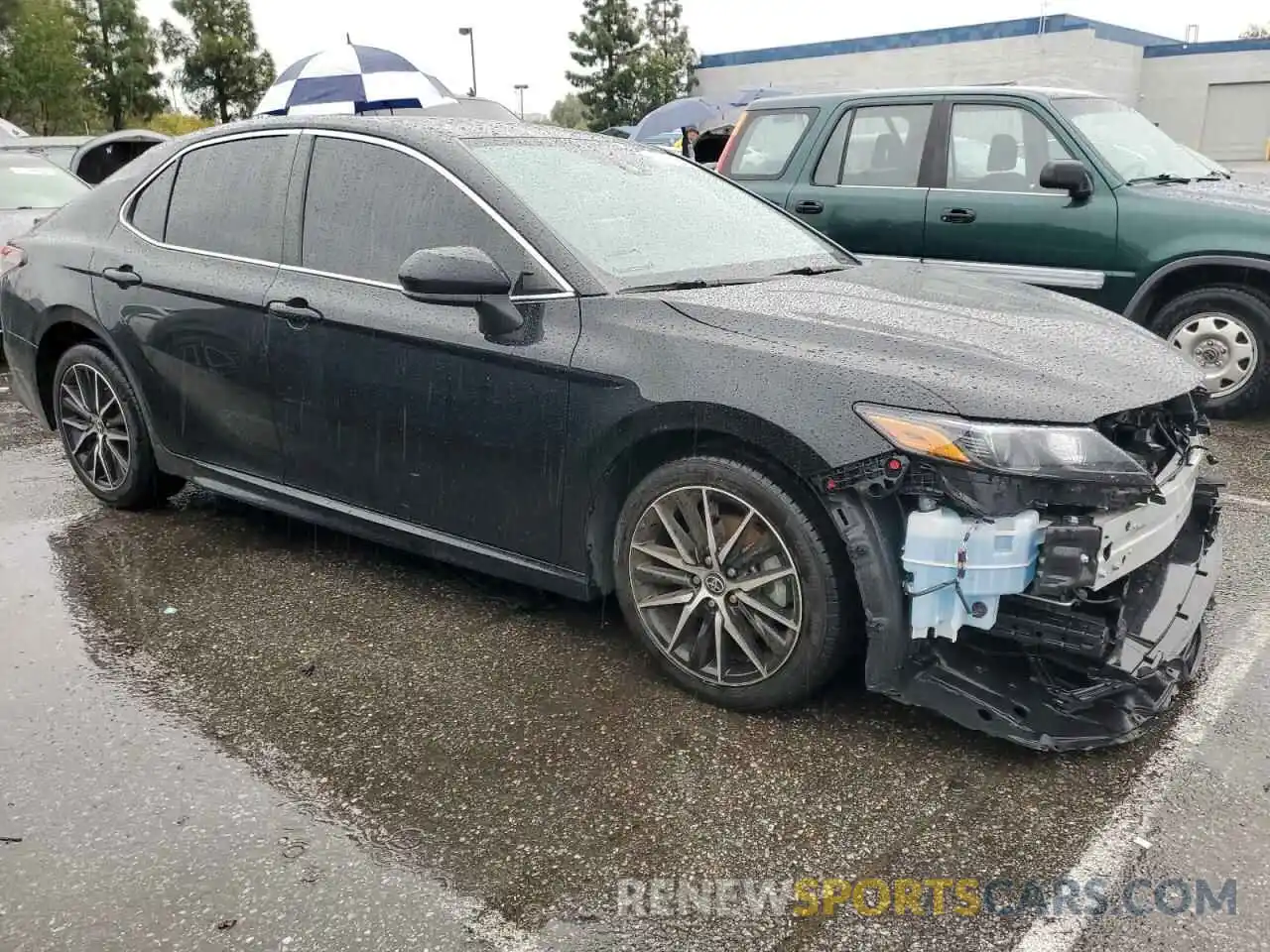 4 Photograph of a damaged car 4T1G11AK6MU493274 TOYOTA CAMRY 2021