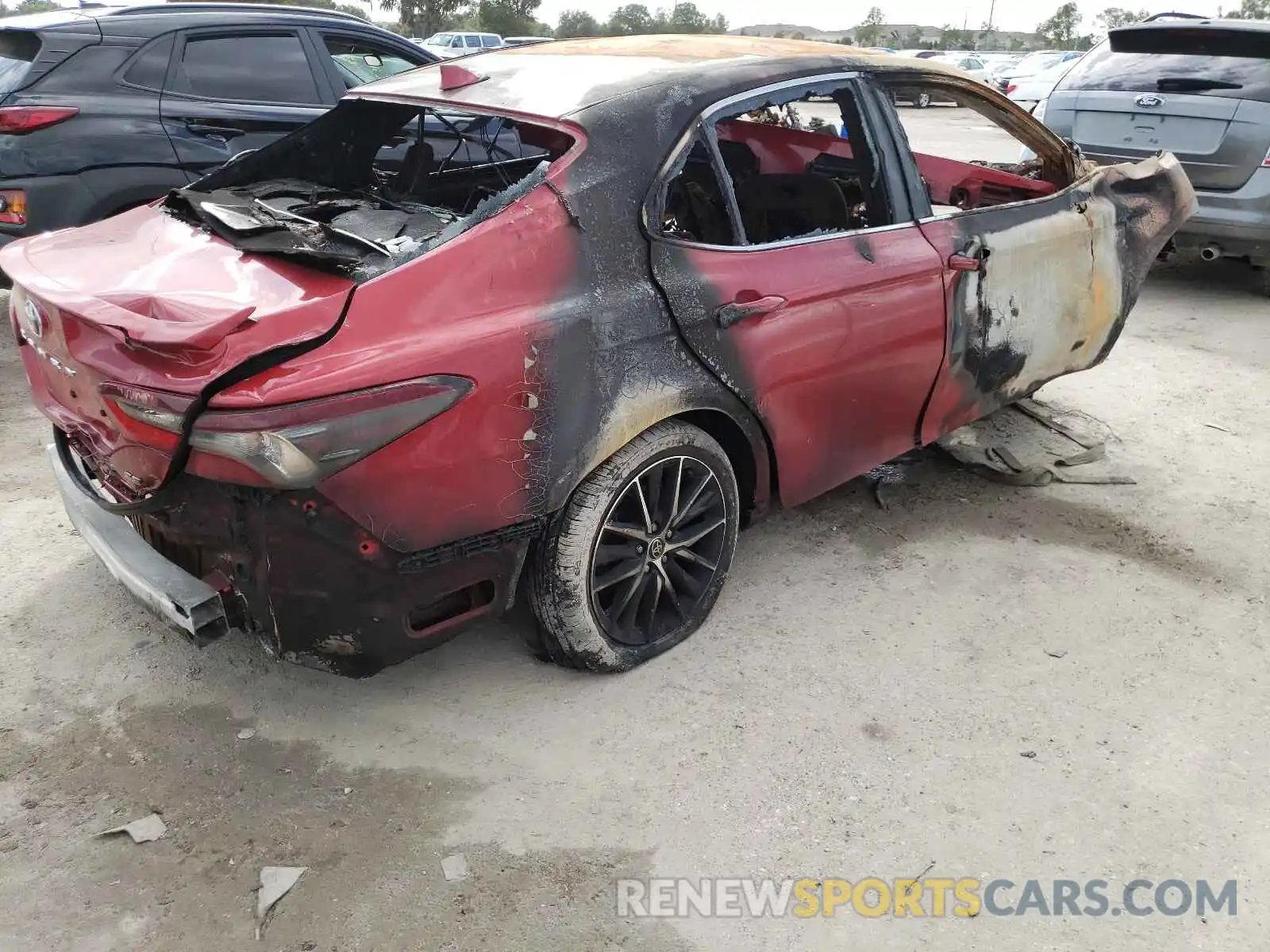 4 Photograph of a damaged car 4T1G11AK6MU493758 TOYOTA CAMRY 2021