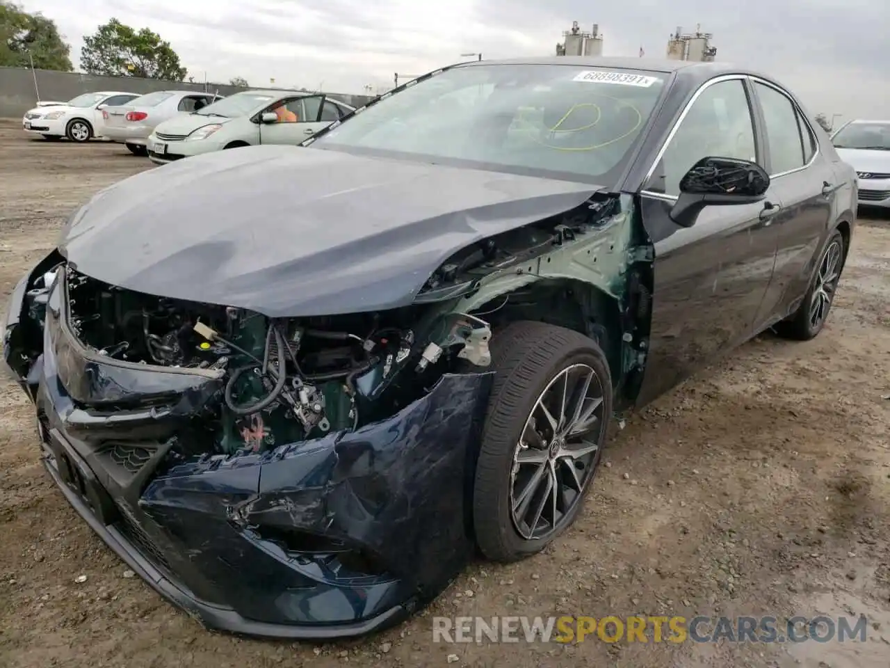 2 Photograph of a damaged car 4T1G11AK6MU494084 TOYOTA CAMRY 2021