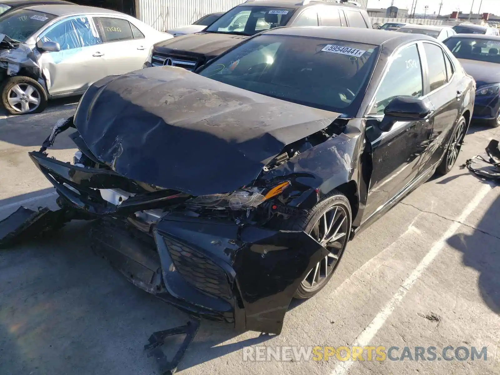 2 Photograph of a damaged car 4T1G11AK6MU516598 TOYOTA CAMRY 2021