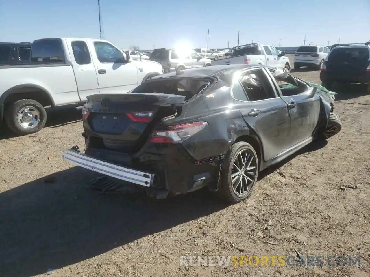 4 Photograph of a damaged car 4T1G11AK6MU519081 TOYOTA CAMRY 2021