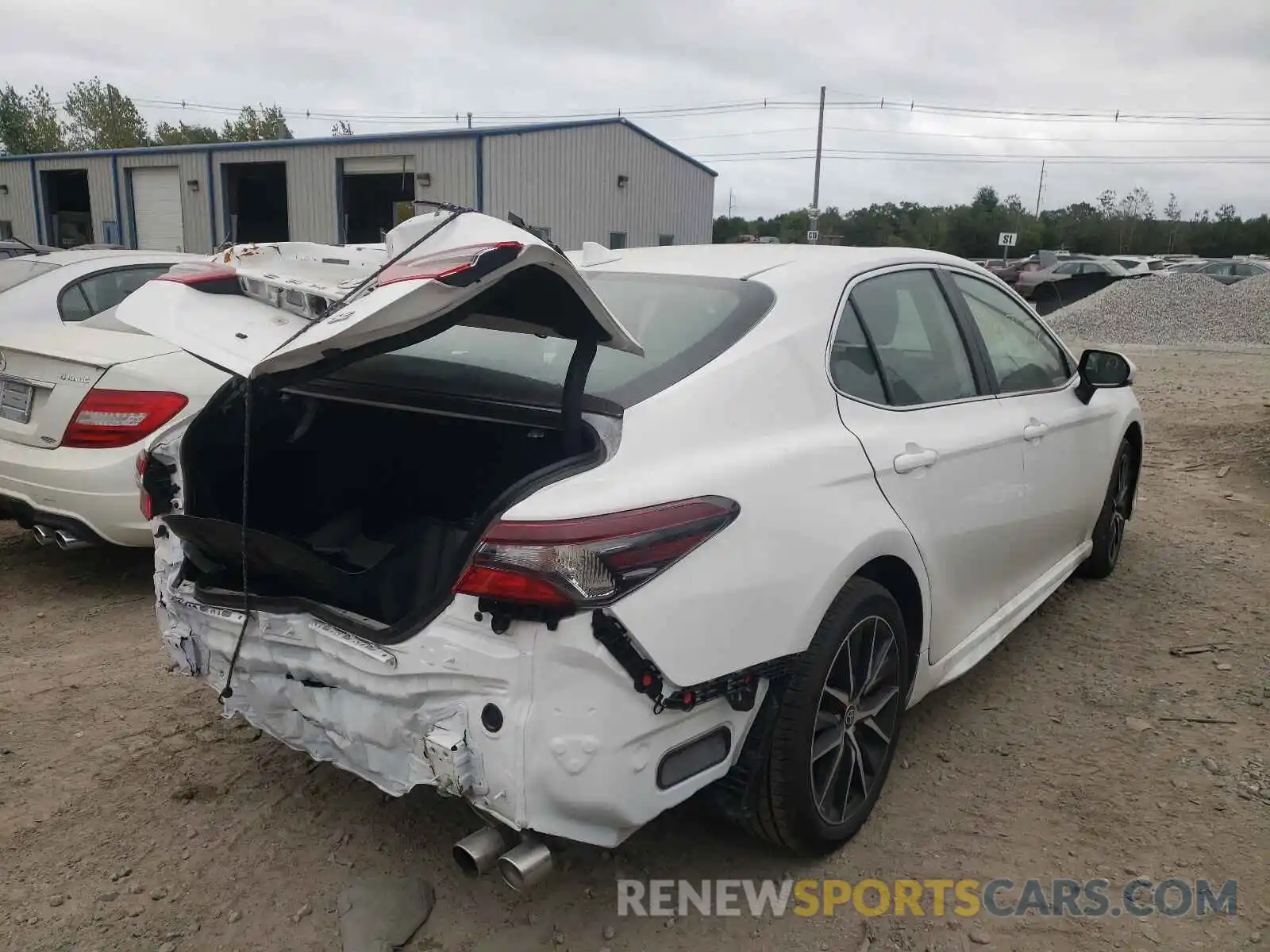 4 Photograph of a damaged car 4T1G11AK6MU561699 TOYOTA CAMRY 2021