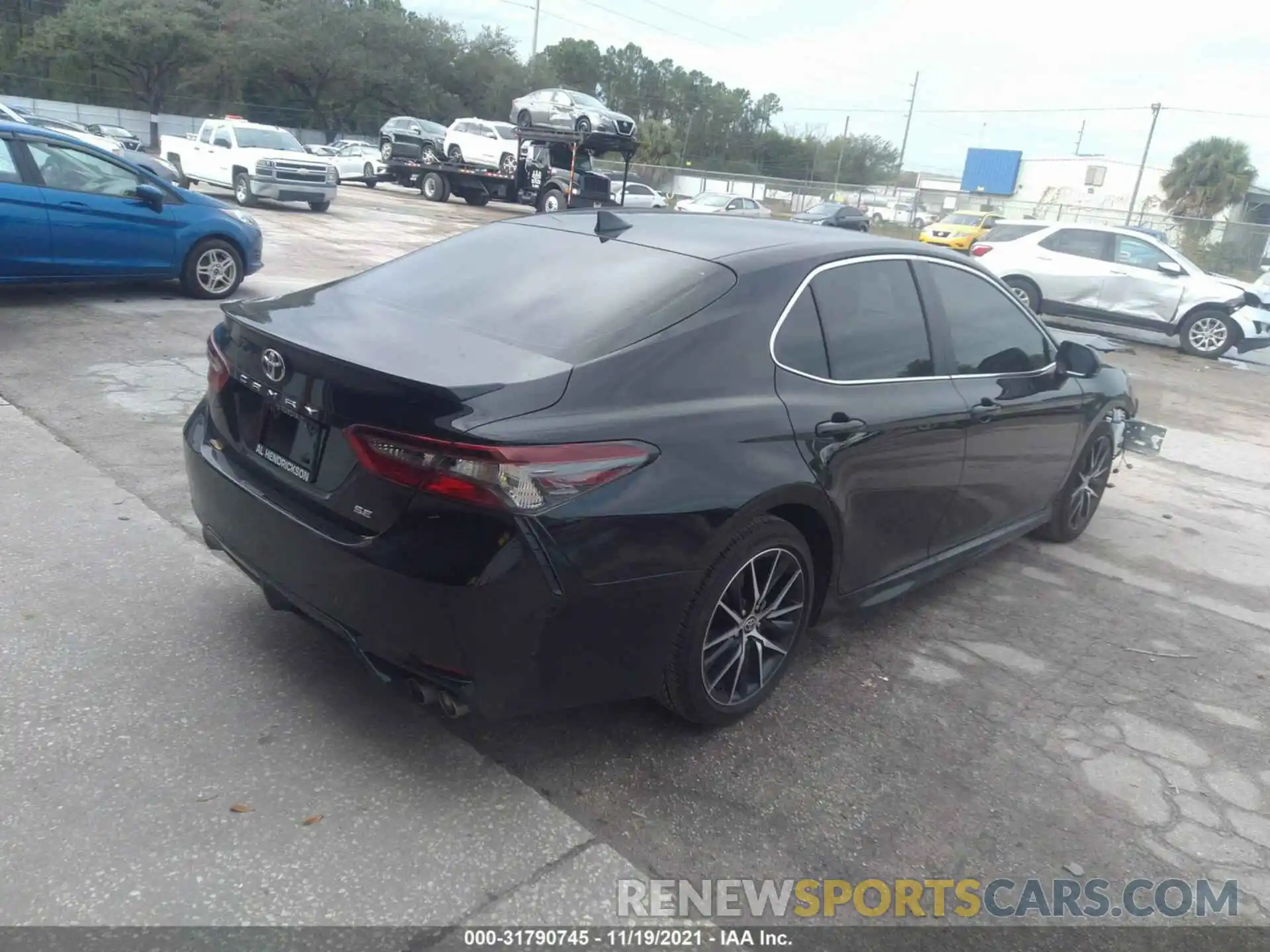 4 Photograph of a damaged car 4T1G11AK6MU563288 TOYOTA CAMRY 2021