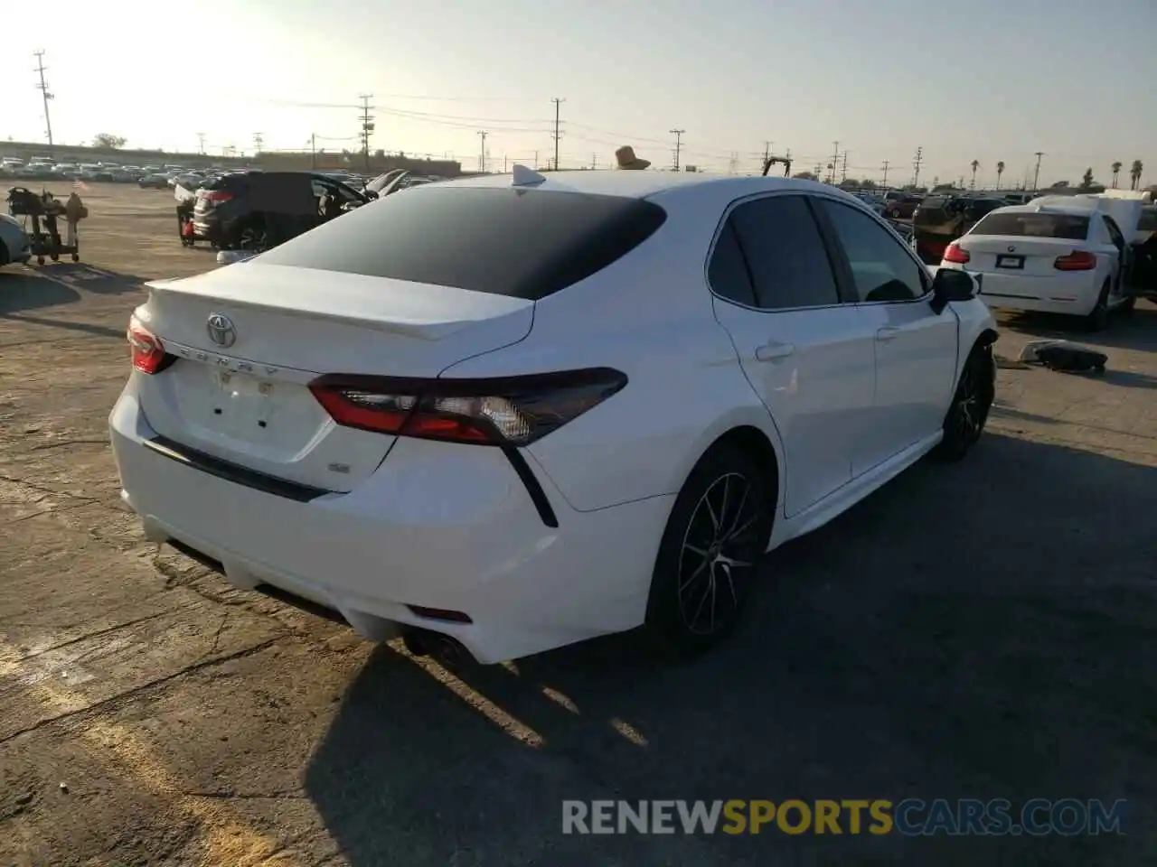 4 Photograph of a damaged car 4T1G11AK6MU563615 TOYOTA CAMRY 2021