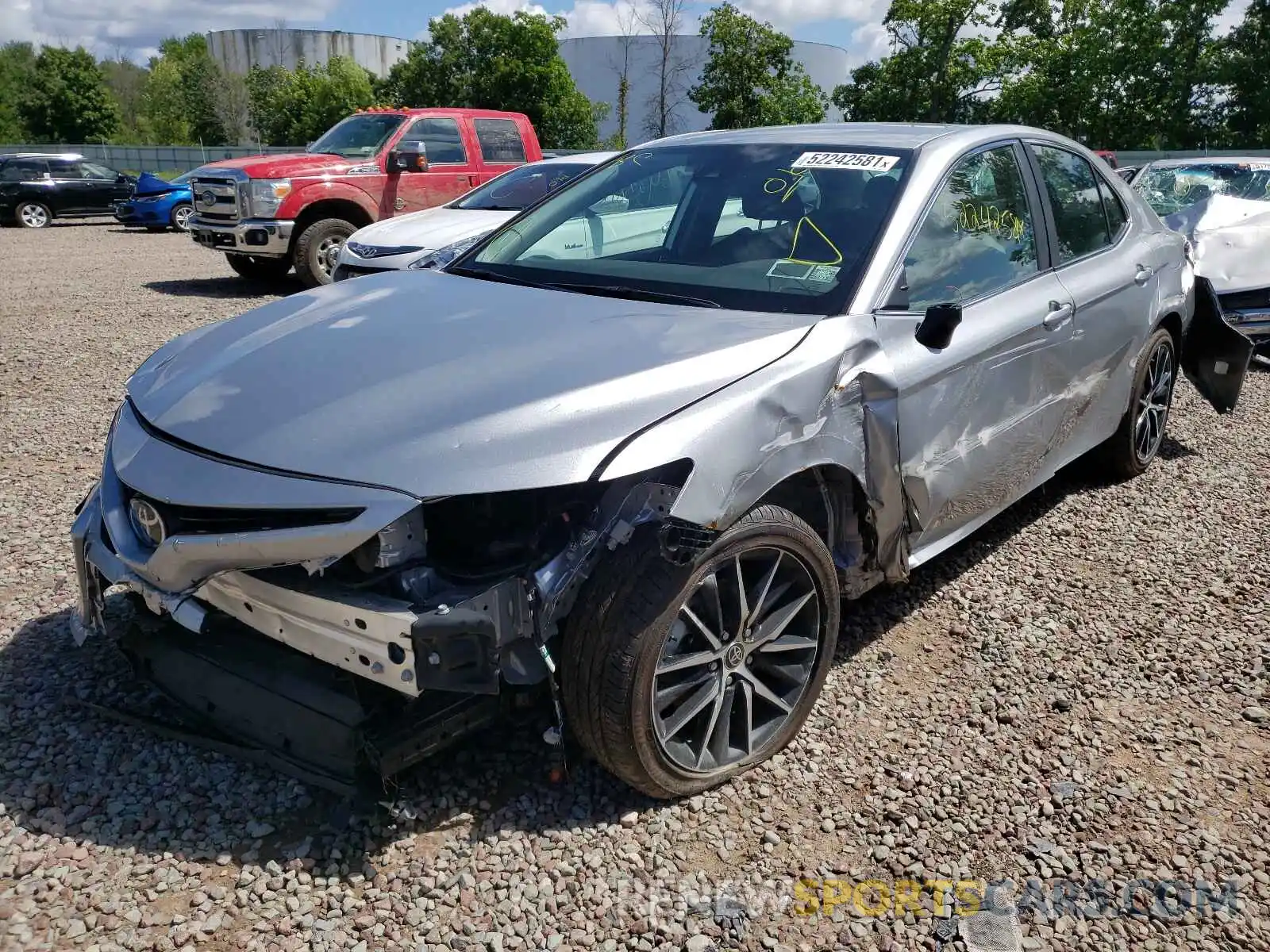 2 Photograph of a damaged car 4T1G11AK6MU573609 TOYOTA CAMRY 2021