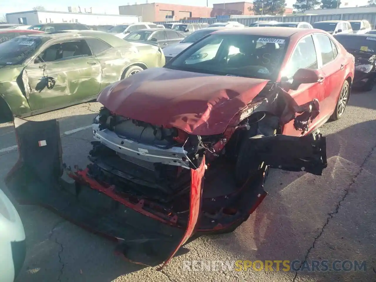 2 Photograph of a damaged car 4T1G11AK7MU424027 TOYOTA CAMRY 2021