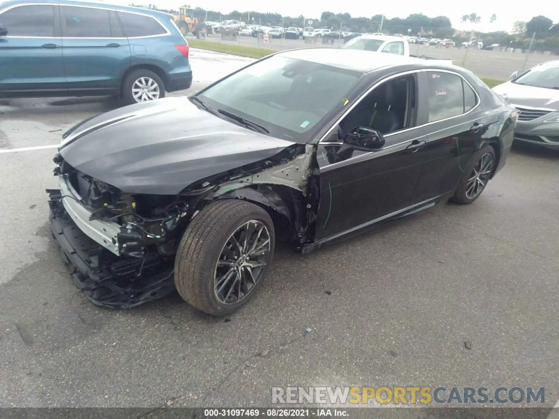 2 Photograph of a damaged car 4T1G11AK7MU450921 TOYOTA CAMRY 2021