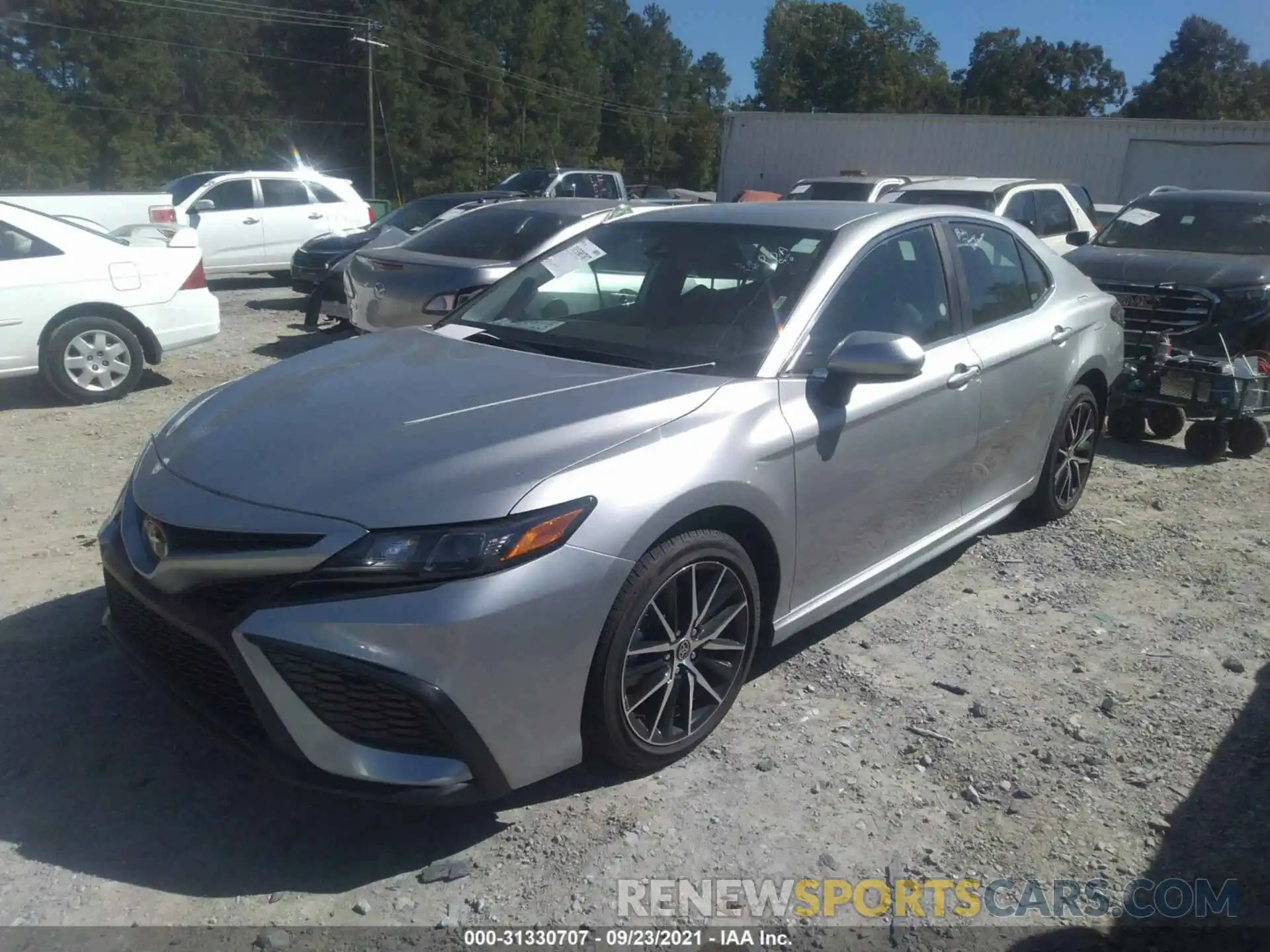 2 Photograph of a damaged car 4T1G11AK7MU573599 TOYOTA CAMRY 2021