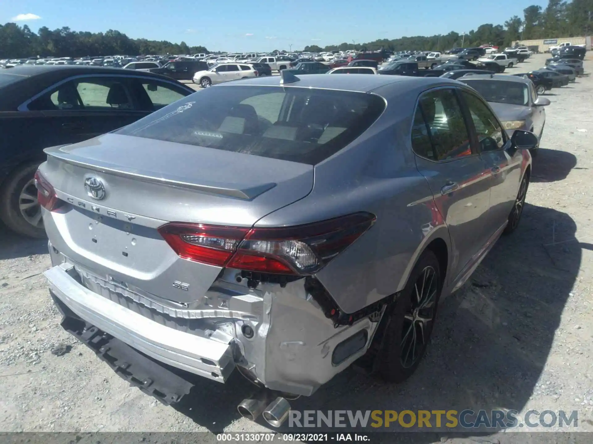 4 Photograph of a damaged car 4T1G11AK7MU573599 TOYOTA CAMRY 2021