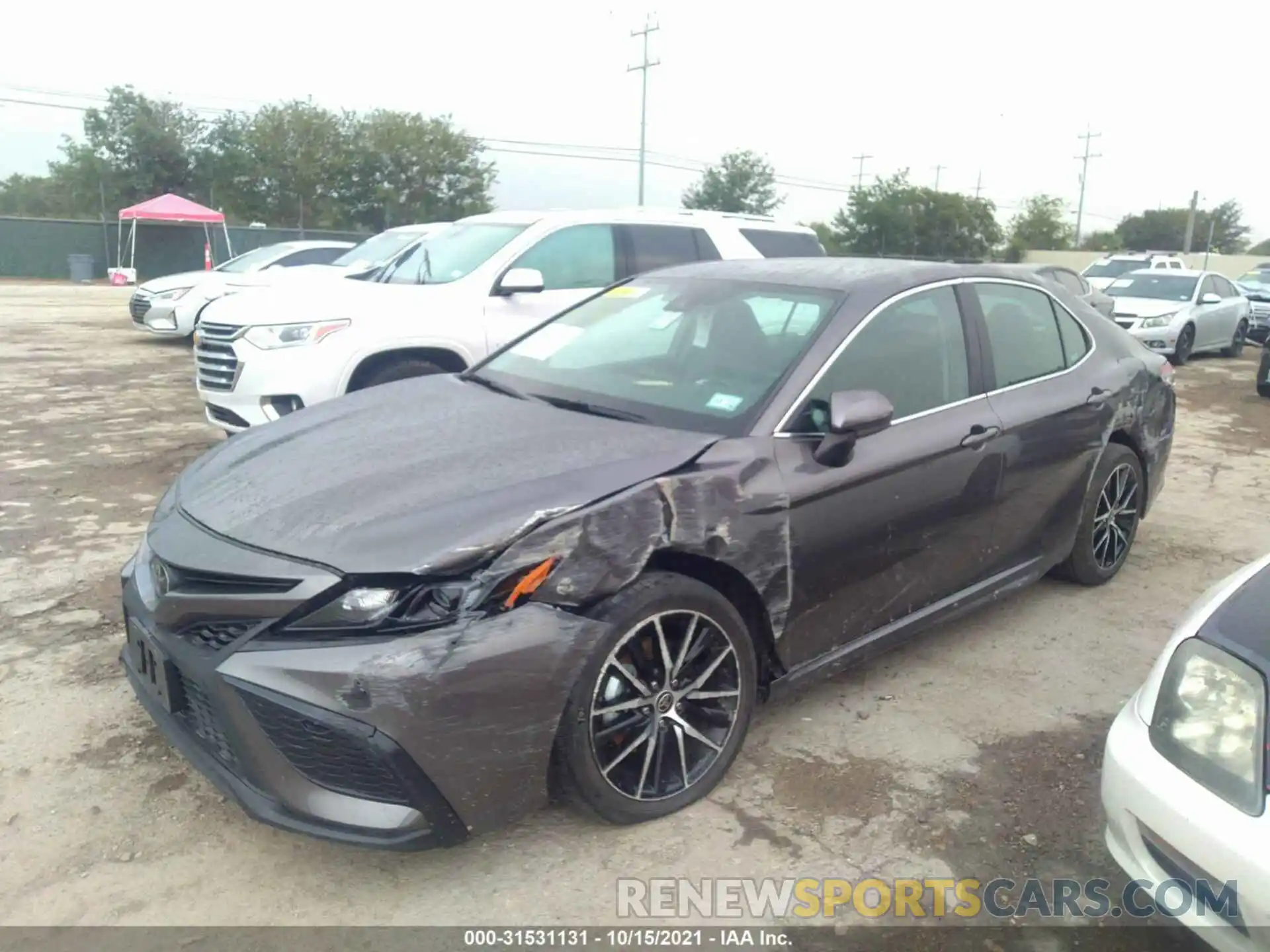 2 Photograph of a damaged car 4T1G11AK7MU574395 TOYOTA CAMRY 2021