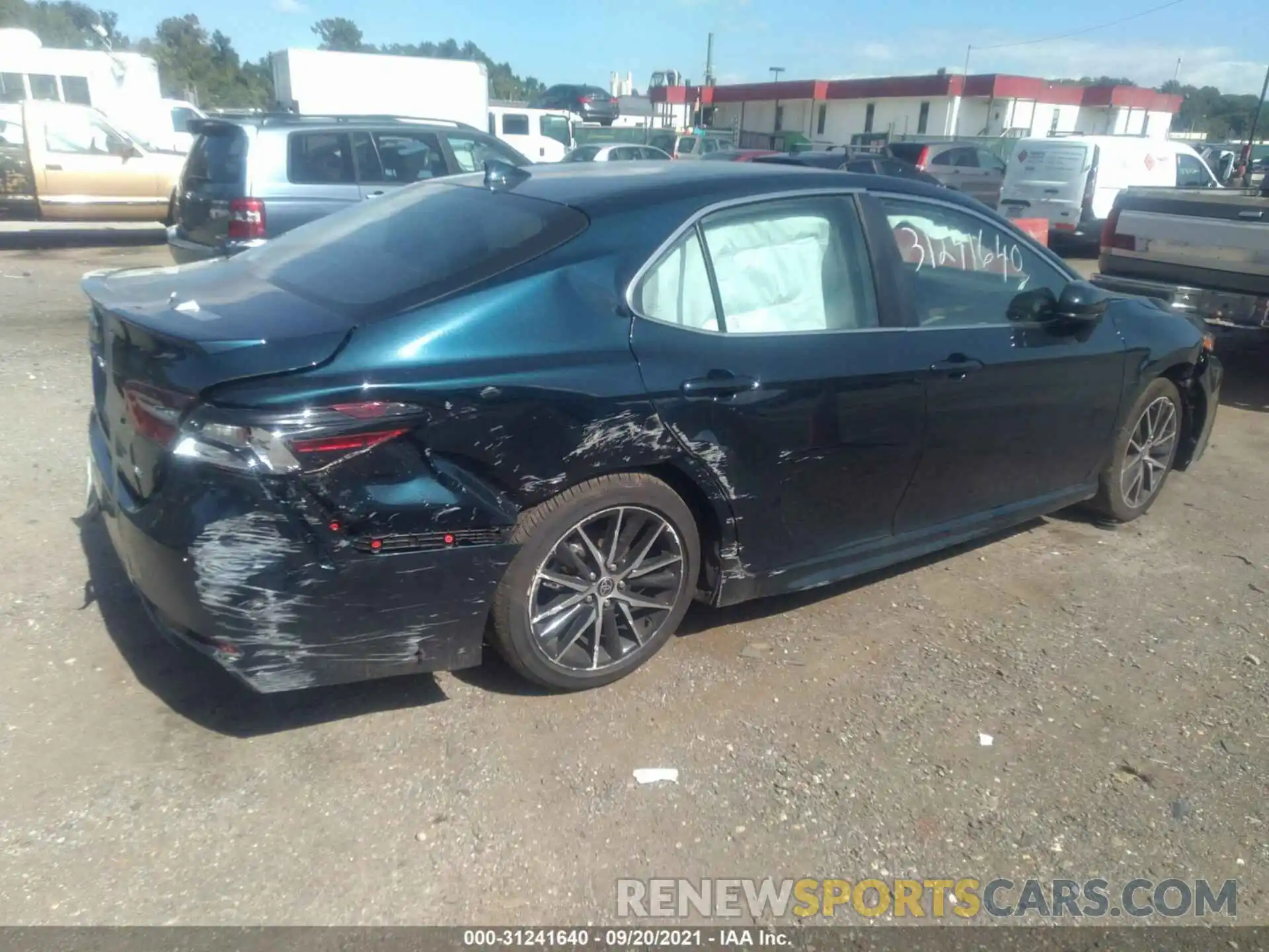 4 Photograph of a damaged car 4T1G11AK7MU598910 TOYOTA CAMRY 2021