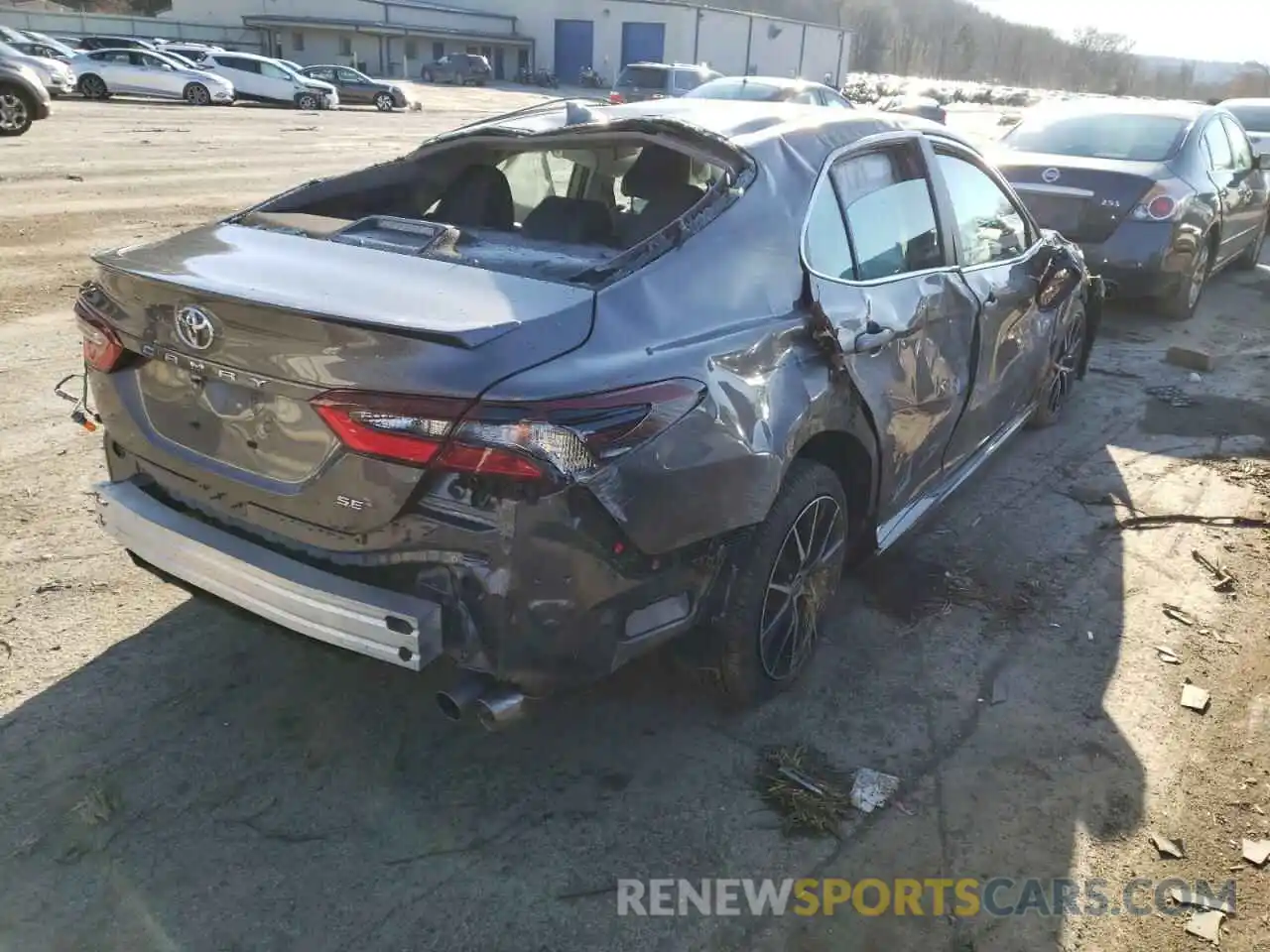 4 Photograph of a damaged car 4T1G11AK7MU599085 TOYOTA CAMRY 2021