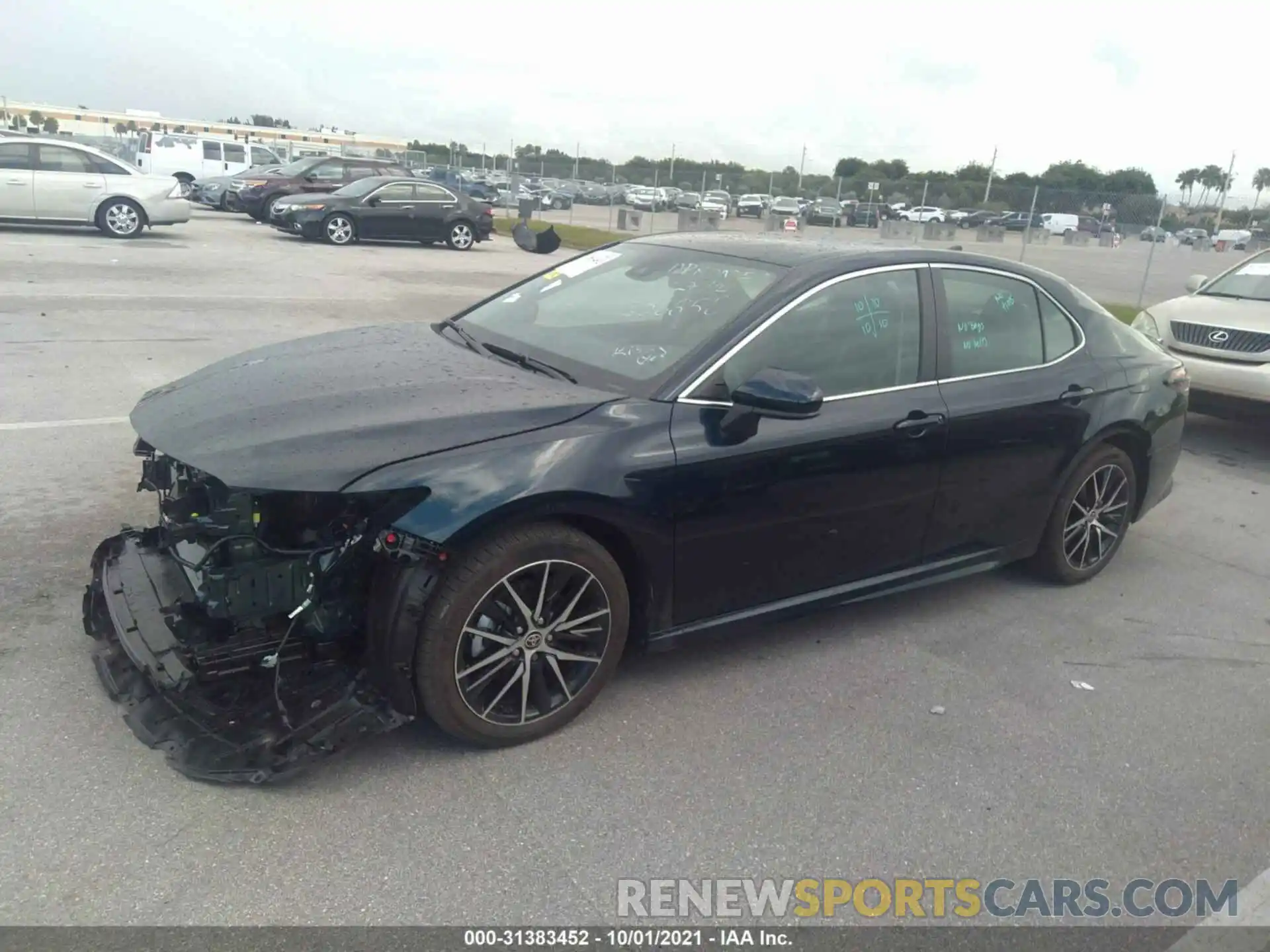 2 Photograph of a damaged car 4T1G11AK7MU606858 TOYOTA CAMRY 2021