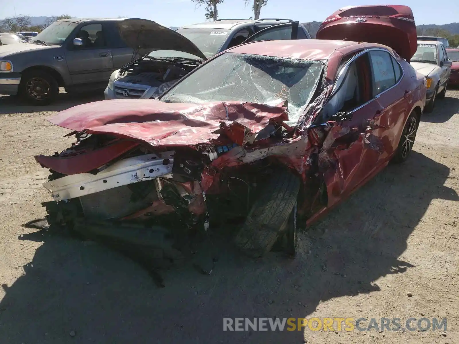 2 Photograph of a damaged car 4T1G11AK8MU457229 TOYOTA CAMRY 2021