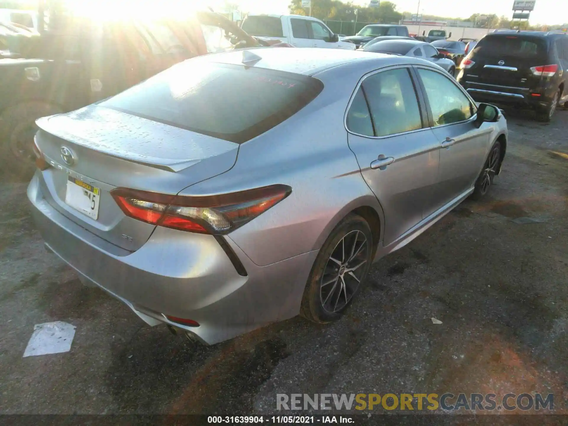 4 Photograph of a damaged car 4T1G11AK8MU518305 TOYOTA CAMRY 2021