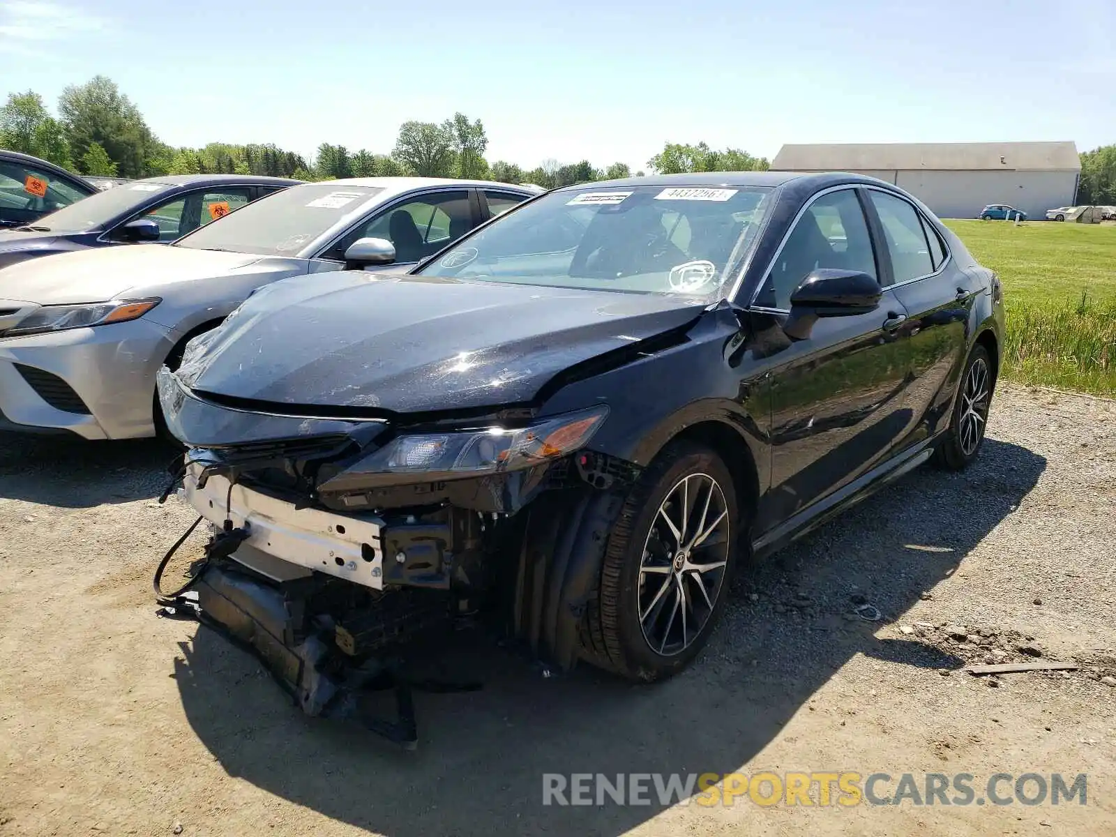 2 Photograph of a damaged car 4T1G11AK8MU540059 TOYOTA CAMRY 2021